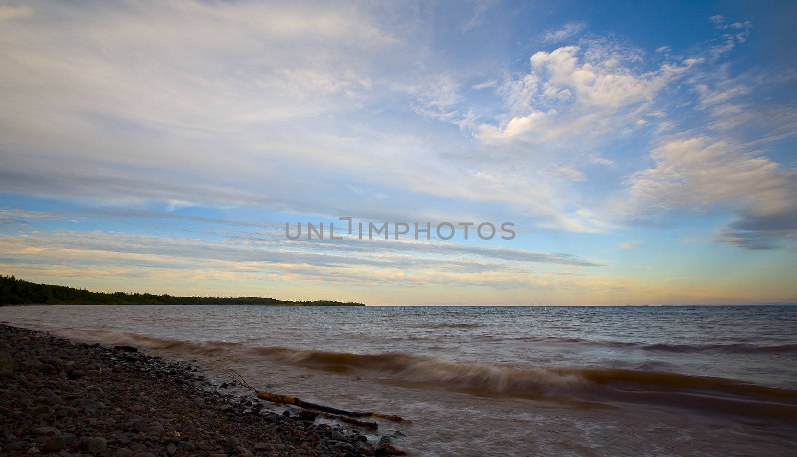 Lake Superior in the evening with a thoughtful sky and surf