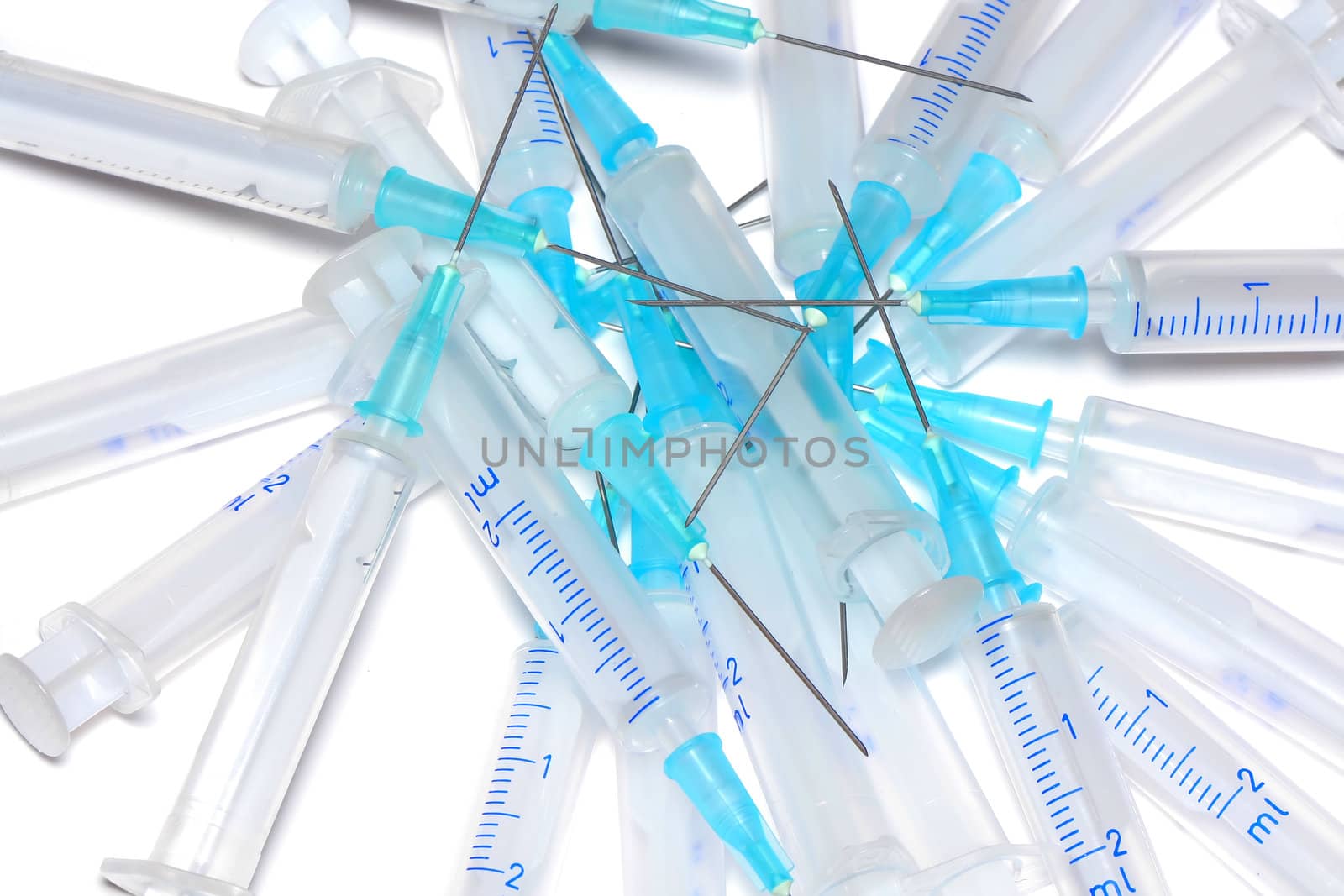 heap of used disposable syringes by zhu_zhu