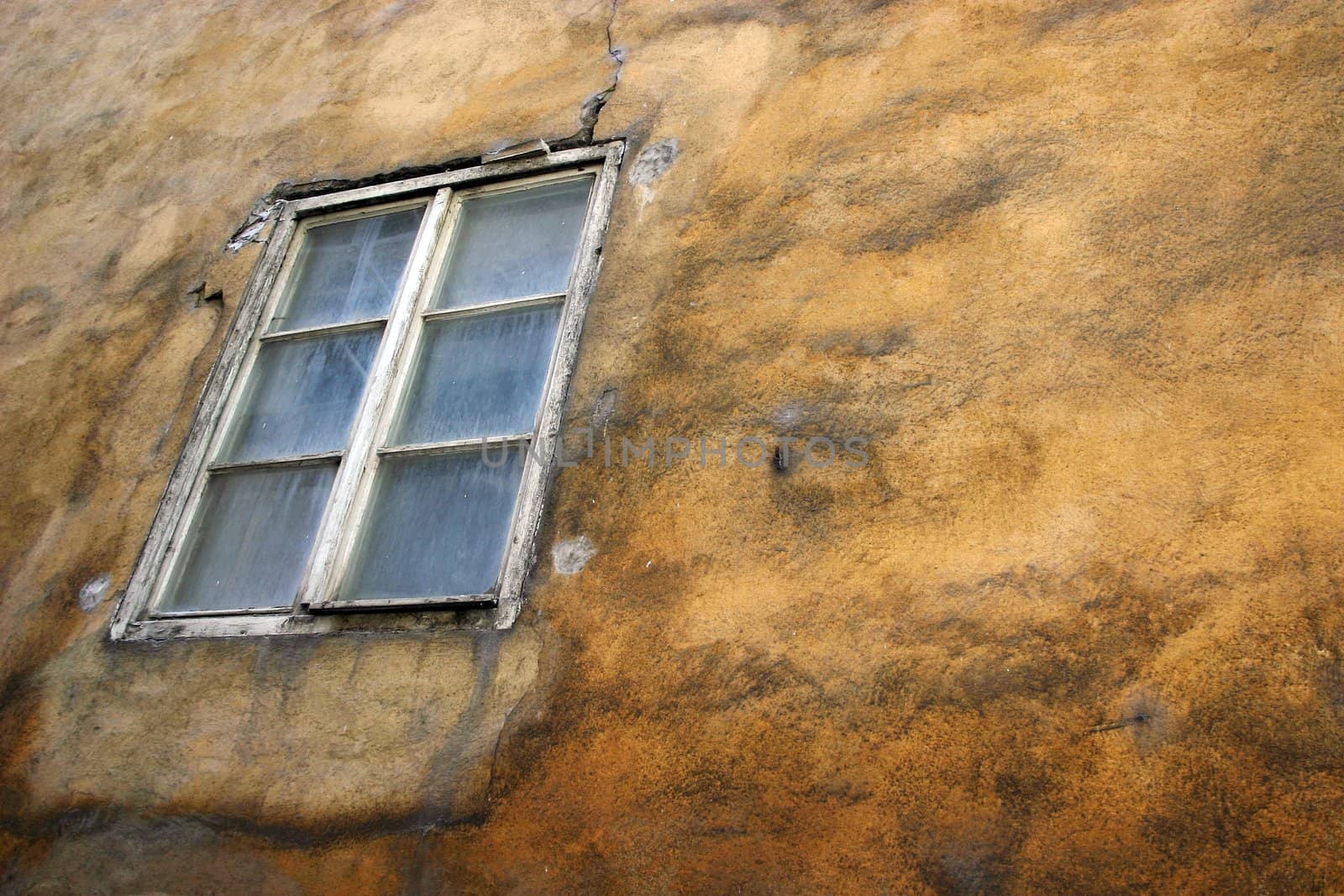 spotted wall with window on alleyway