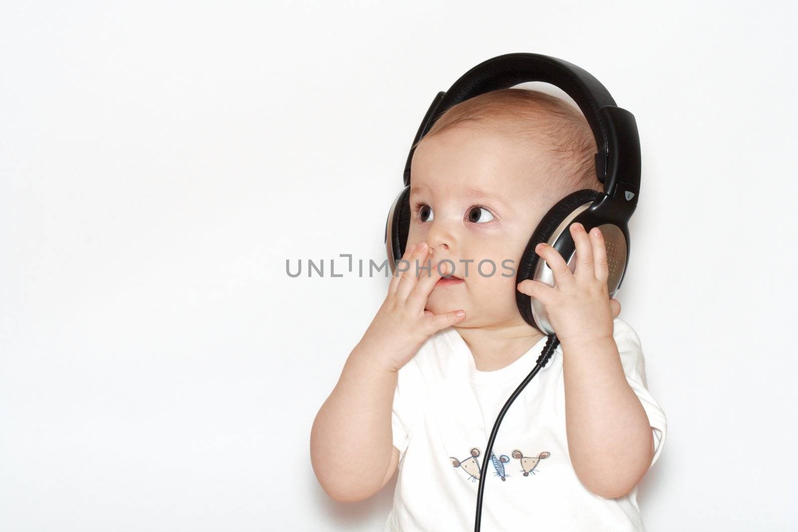 small boys with headphones