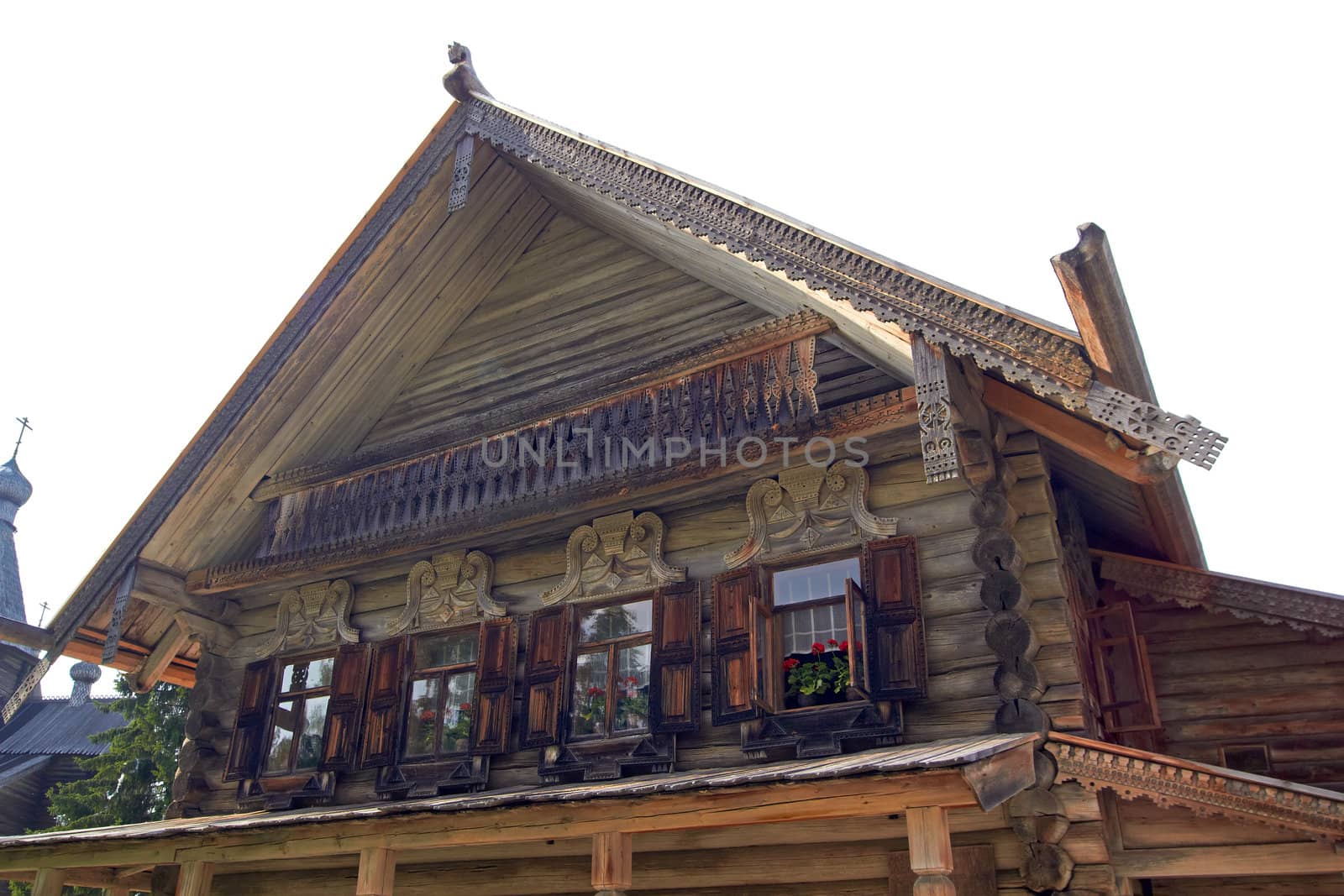 A very old Russian cottage in the dull day