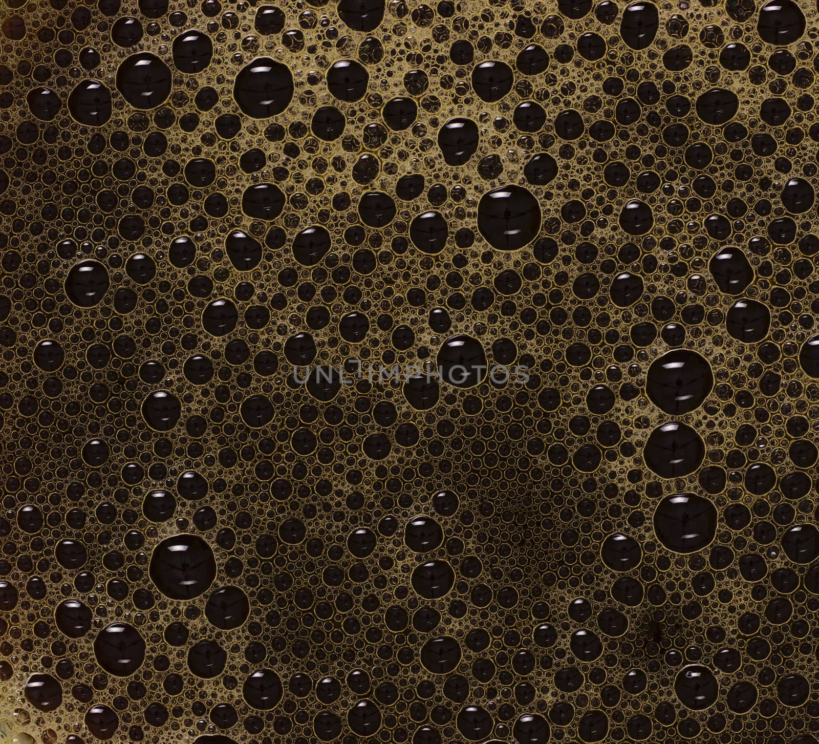 close up of black coffee bubbles