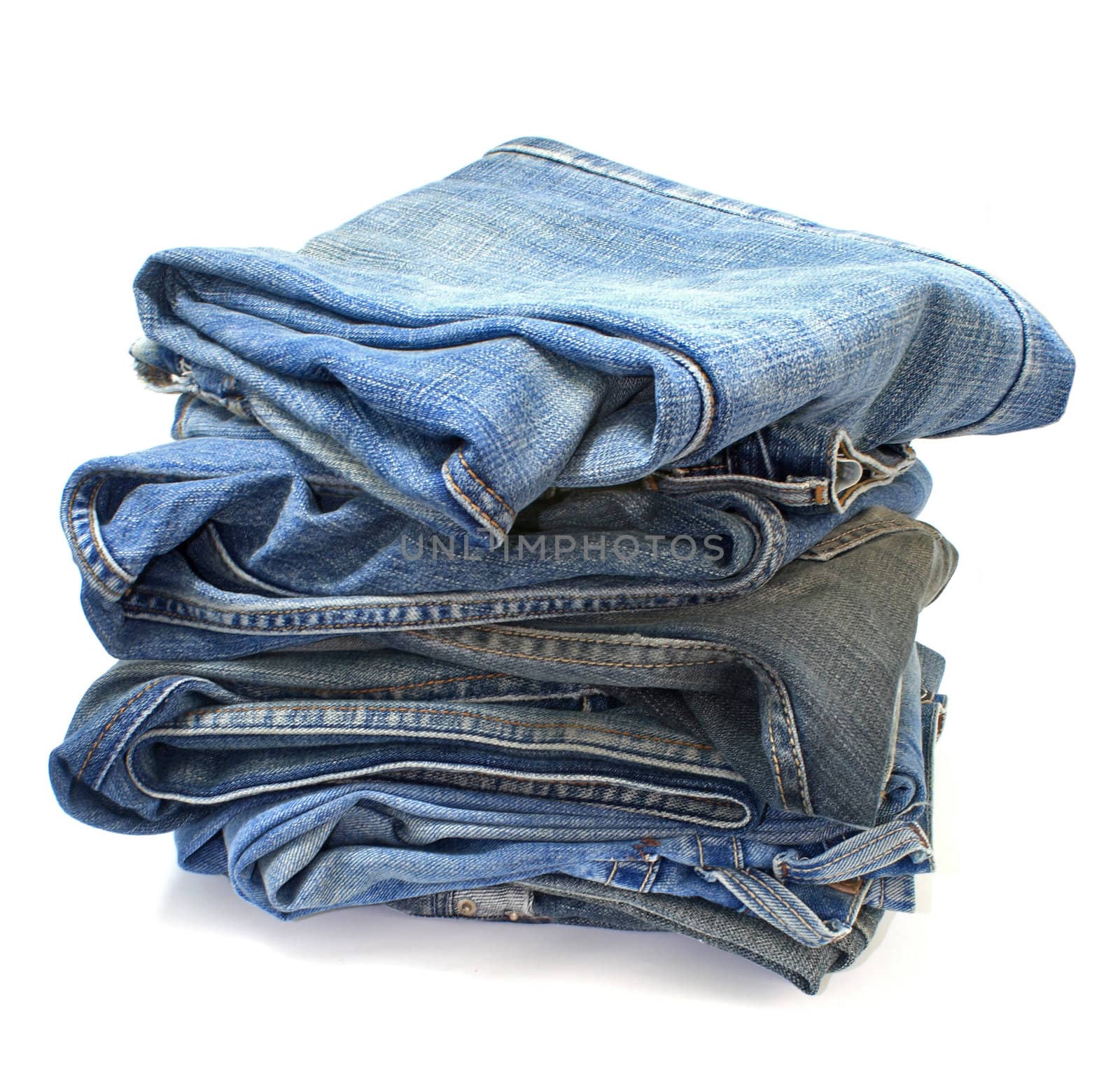 stack of jeans closeup with white background