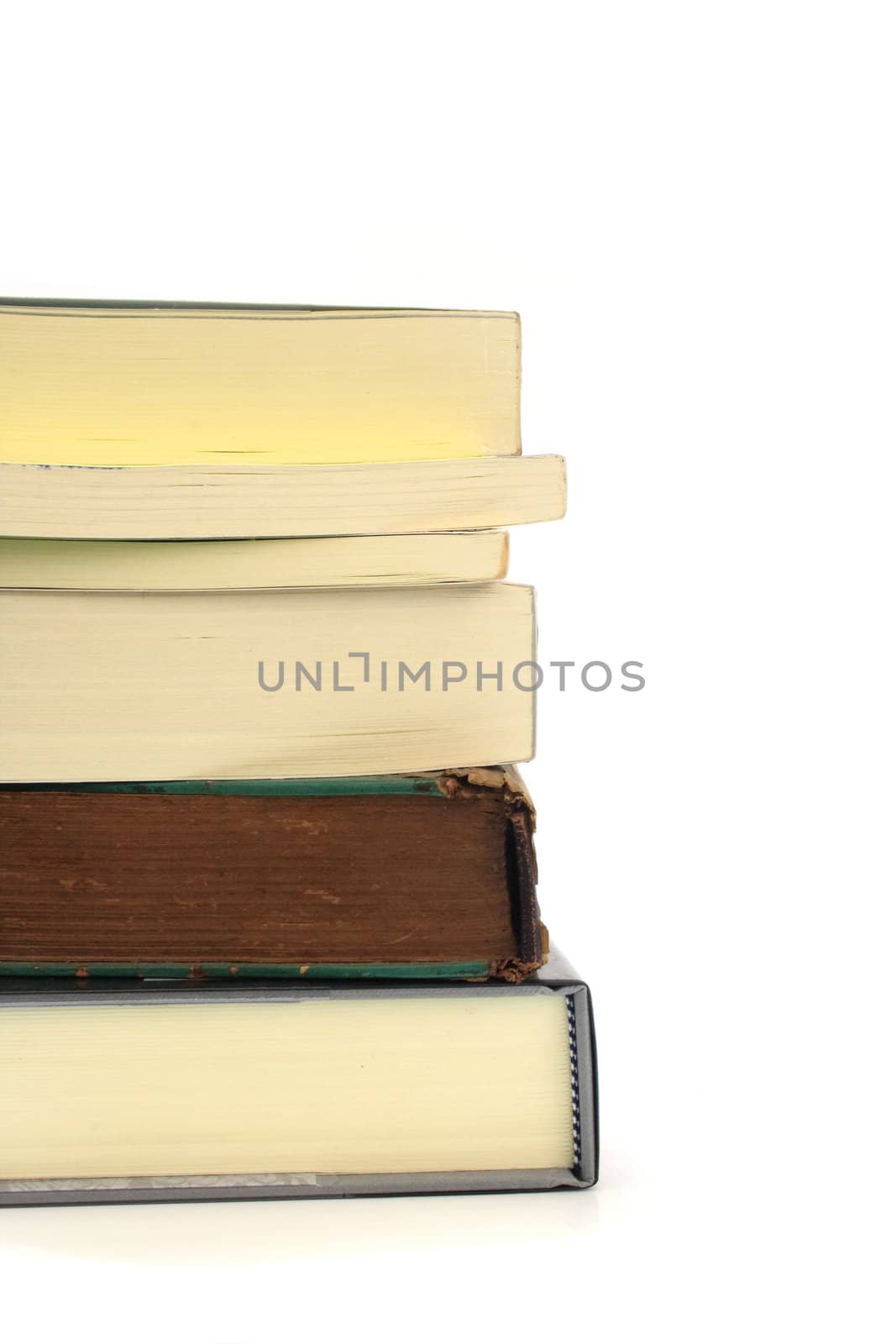 Stack of books on white background