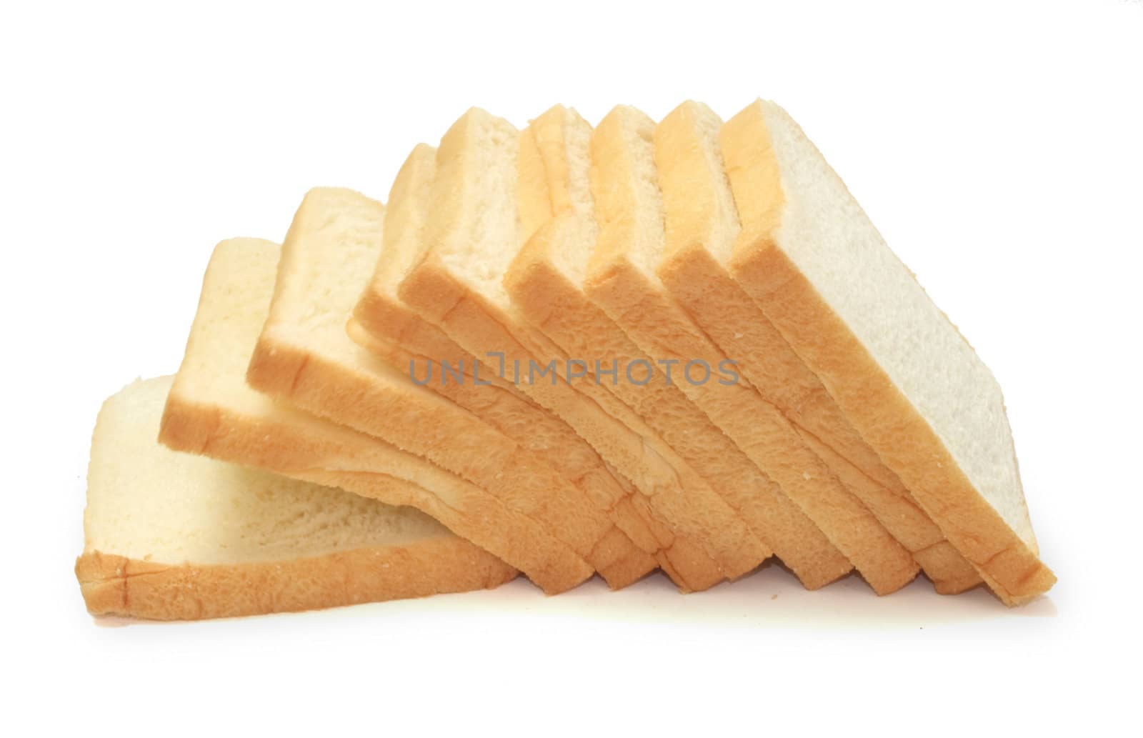 Slices of bread on white background