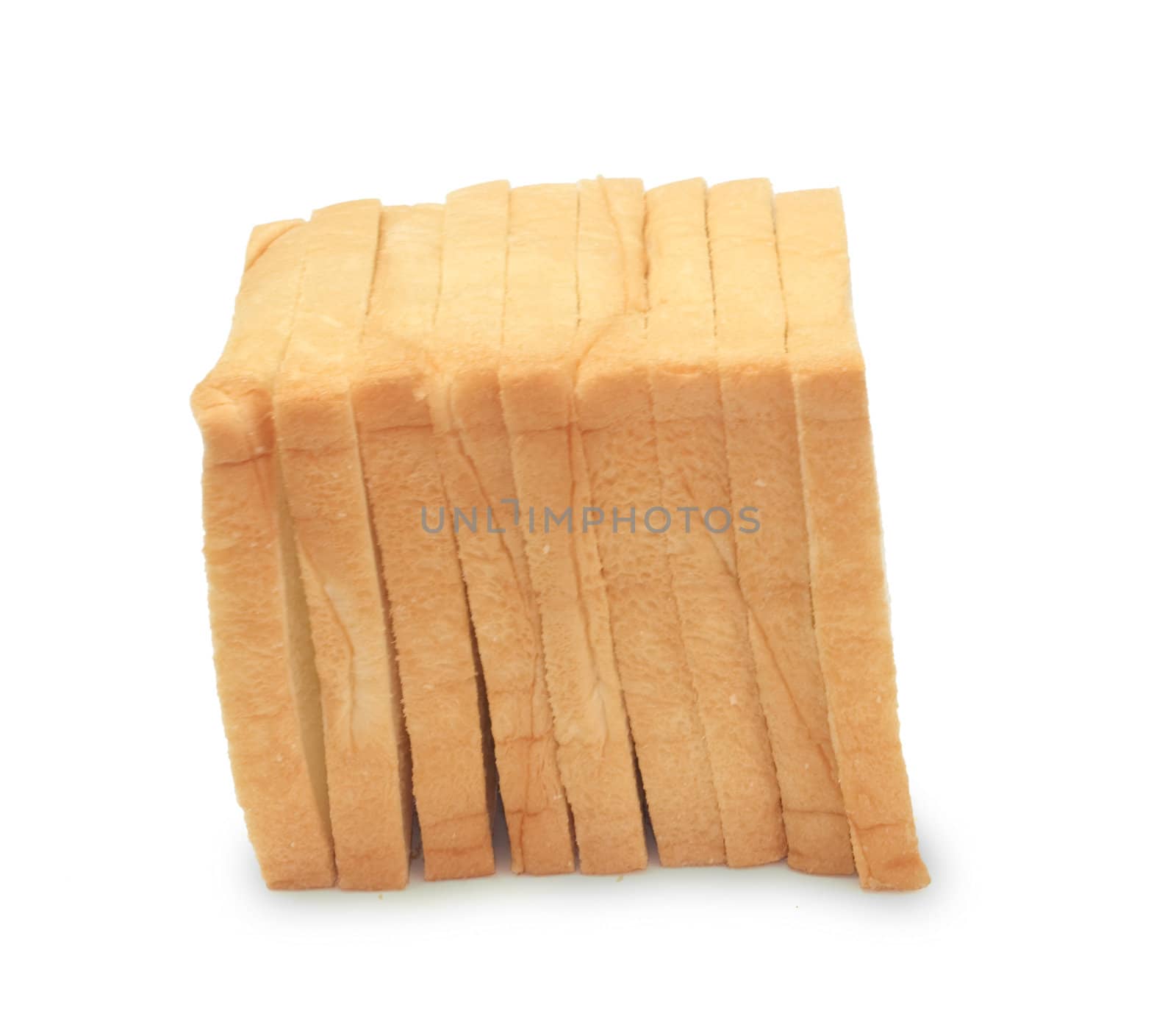 Slices of bread on white background