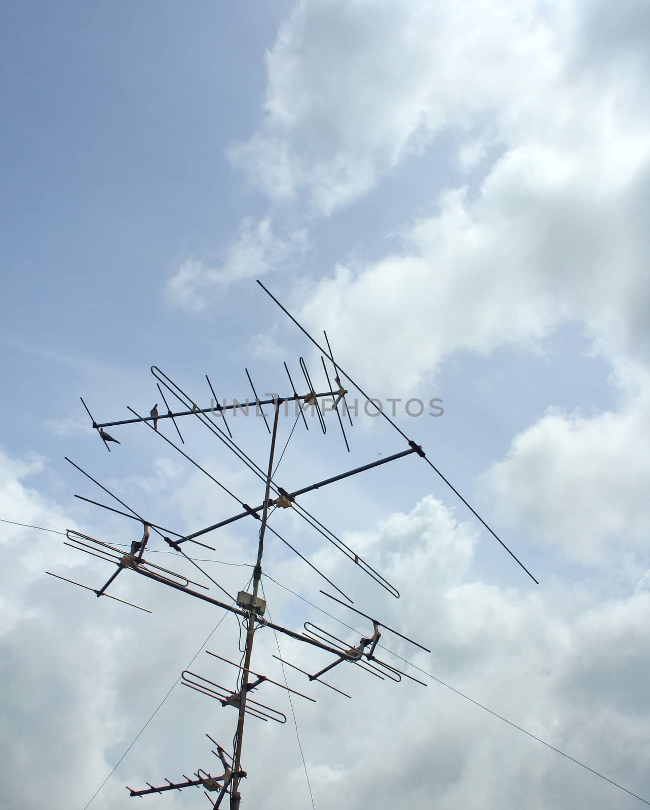 Television antenna blue sky background