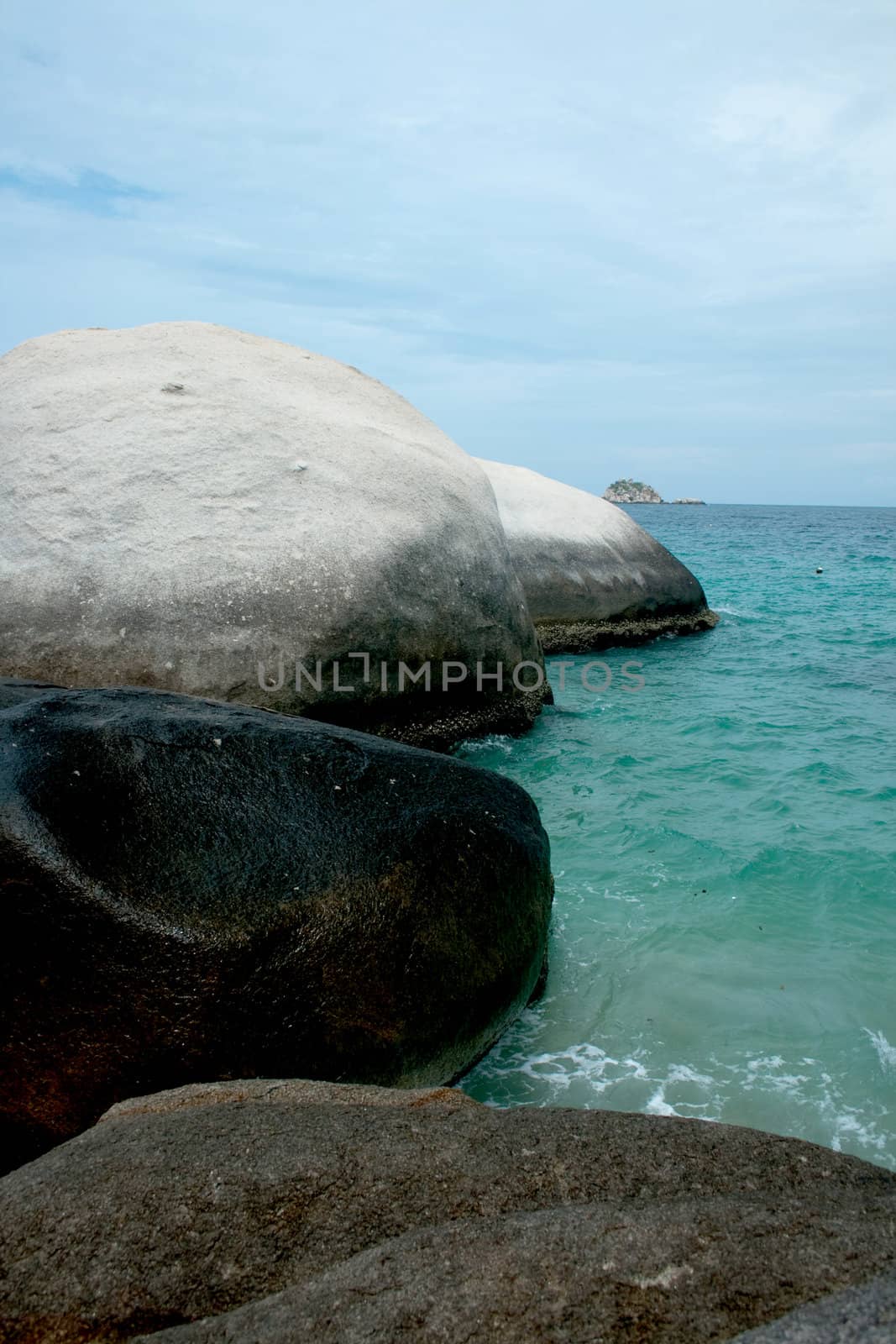 Sea coast with stones in water