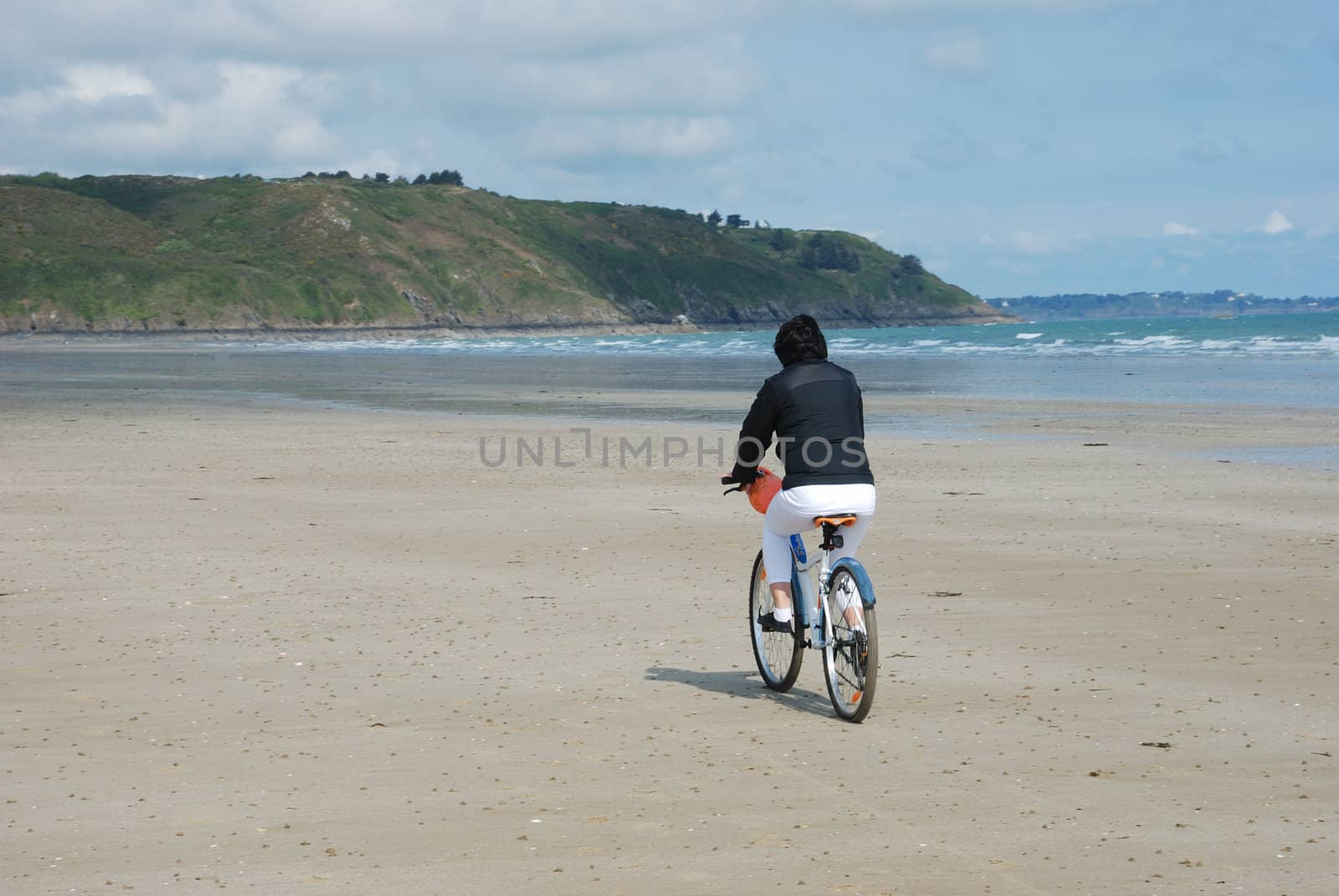 Bike rider on beach