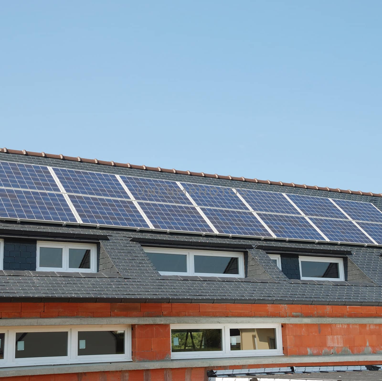 House with solar panels on roof
