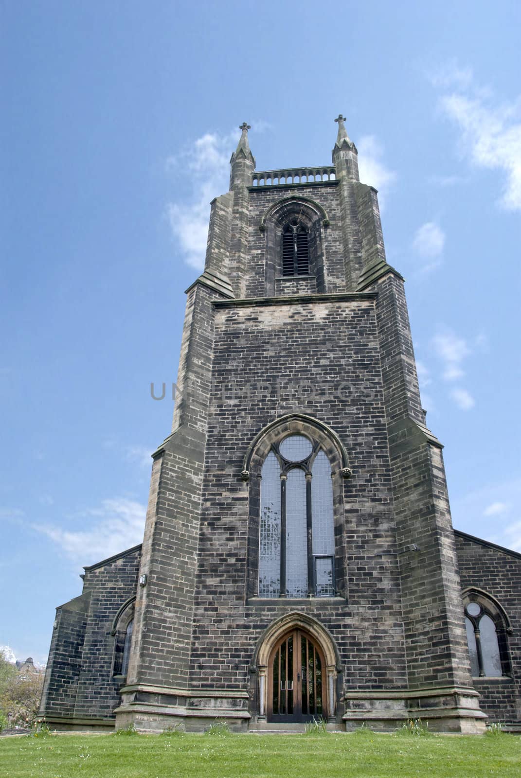 A Church Tower in Skipton Yorkshire against a blue spring sky