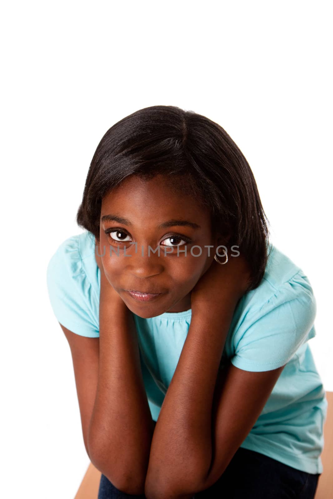 Beautiful sad young teenager girl with sad expression for worries and problem concept sitting with hands in neck, isolated.