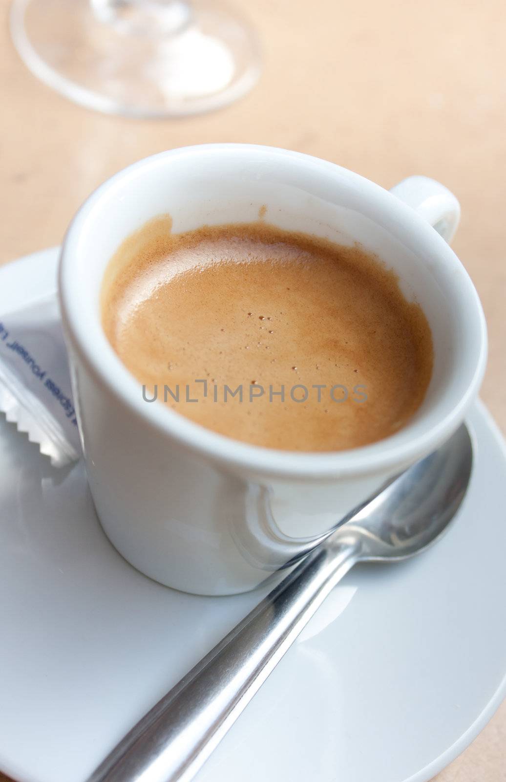 white cup of coffee, espresso and glass of water