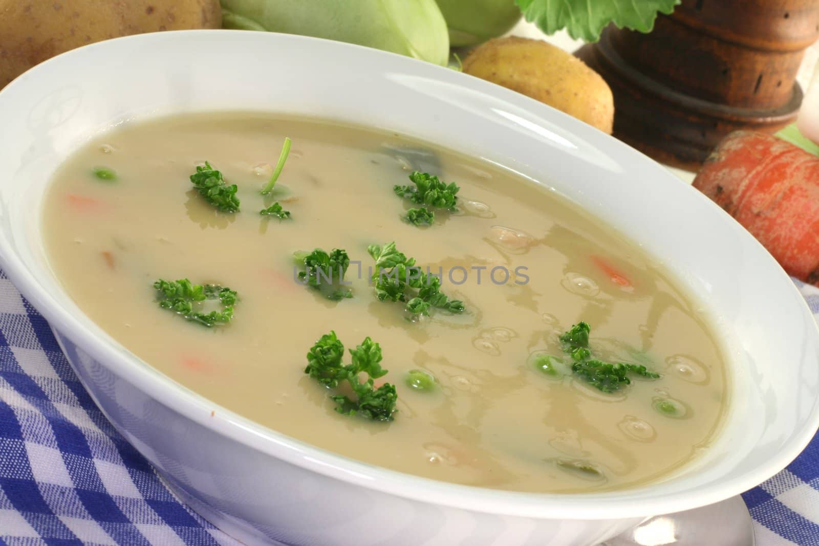 Potato soup with fresh parsley and bacon