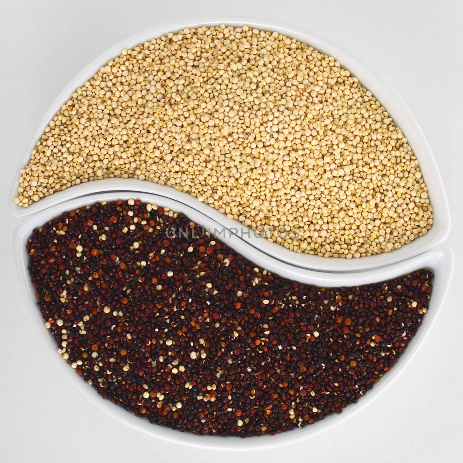 Raw Red and White Quinoa Grains by ildi