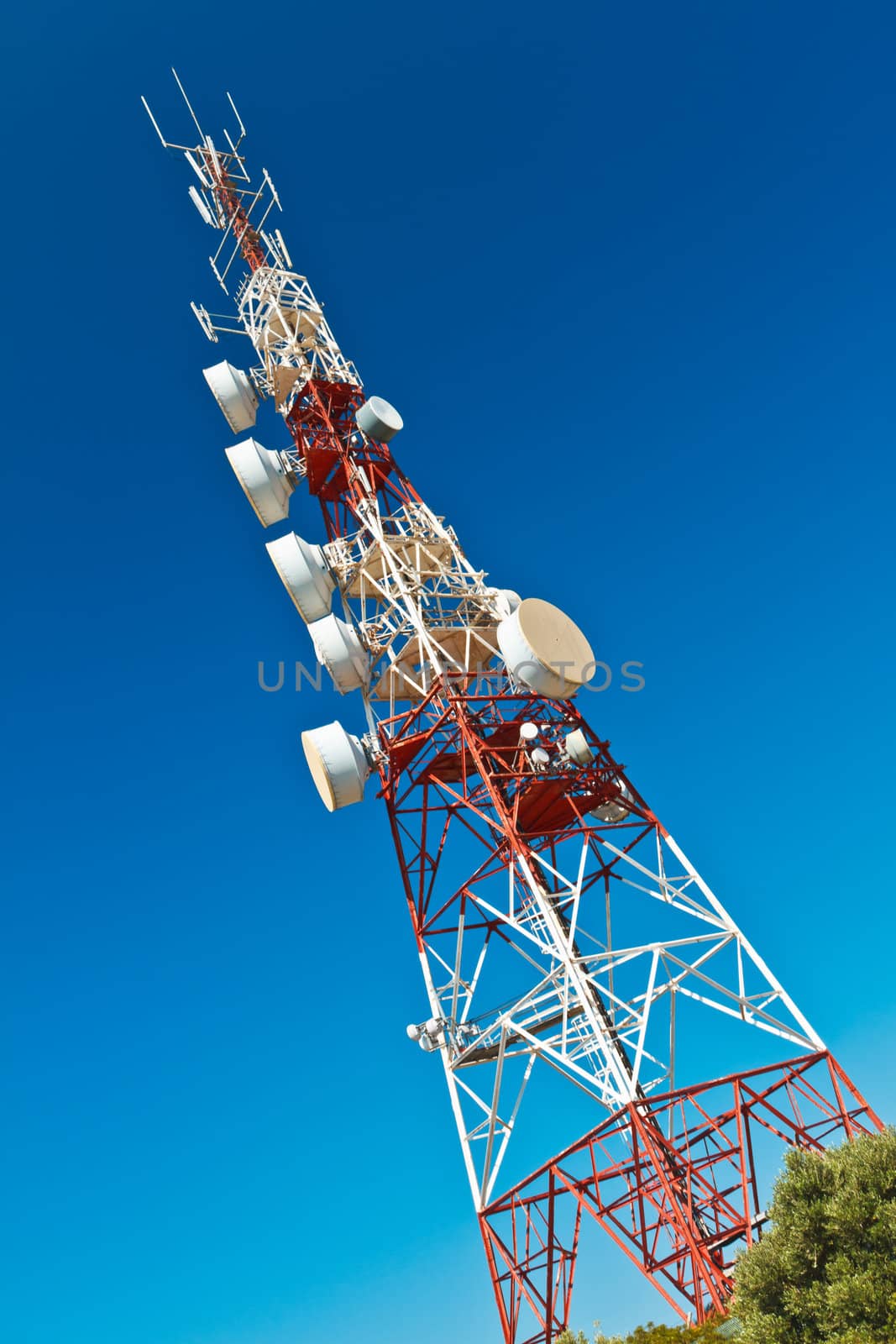 Communications tower with a beautiful blue sky