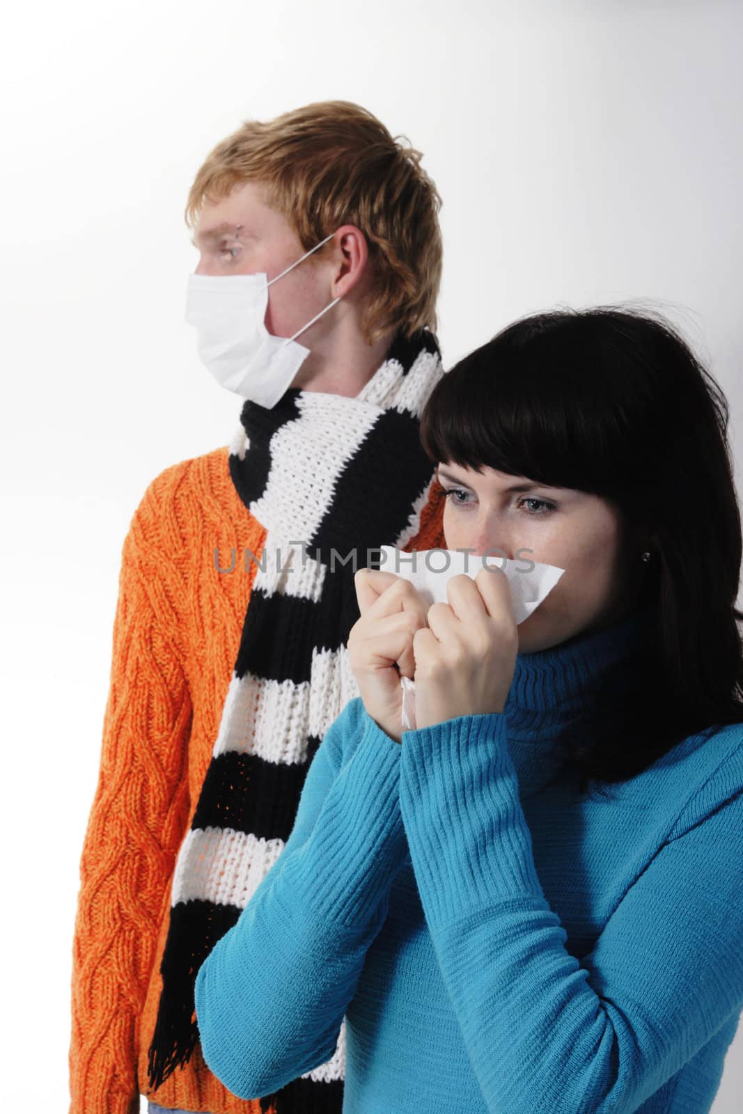girl was ill of influenza, a man stands behind a mask A(H1N1)