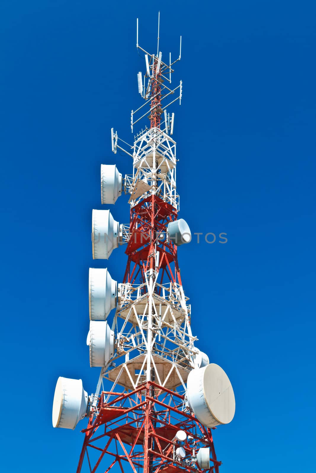 Communications tower with a beautiful blue sky