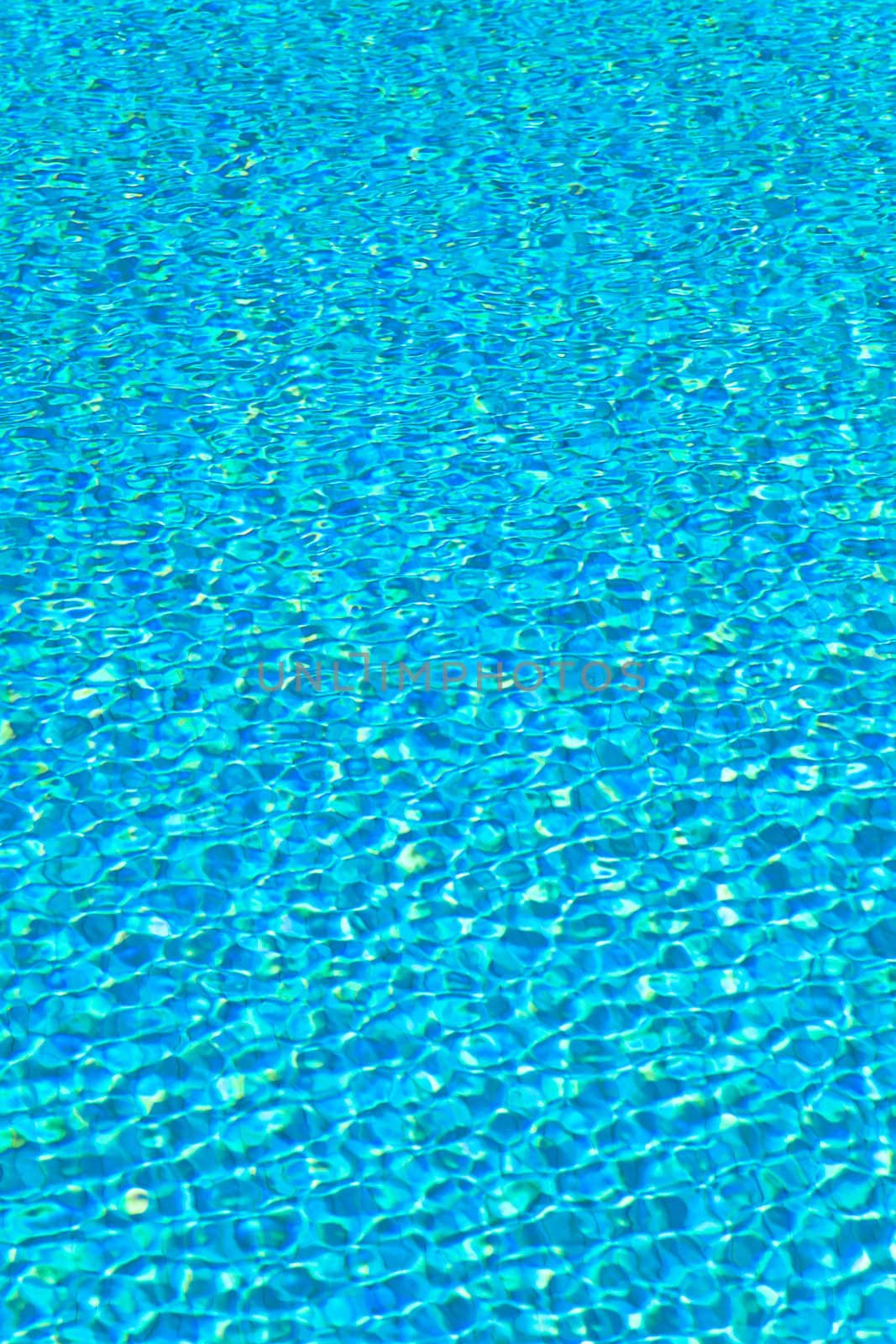 Abstract composition of the water of a swimming pool and its reflections