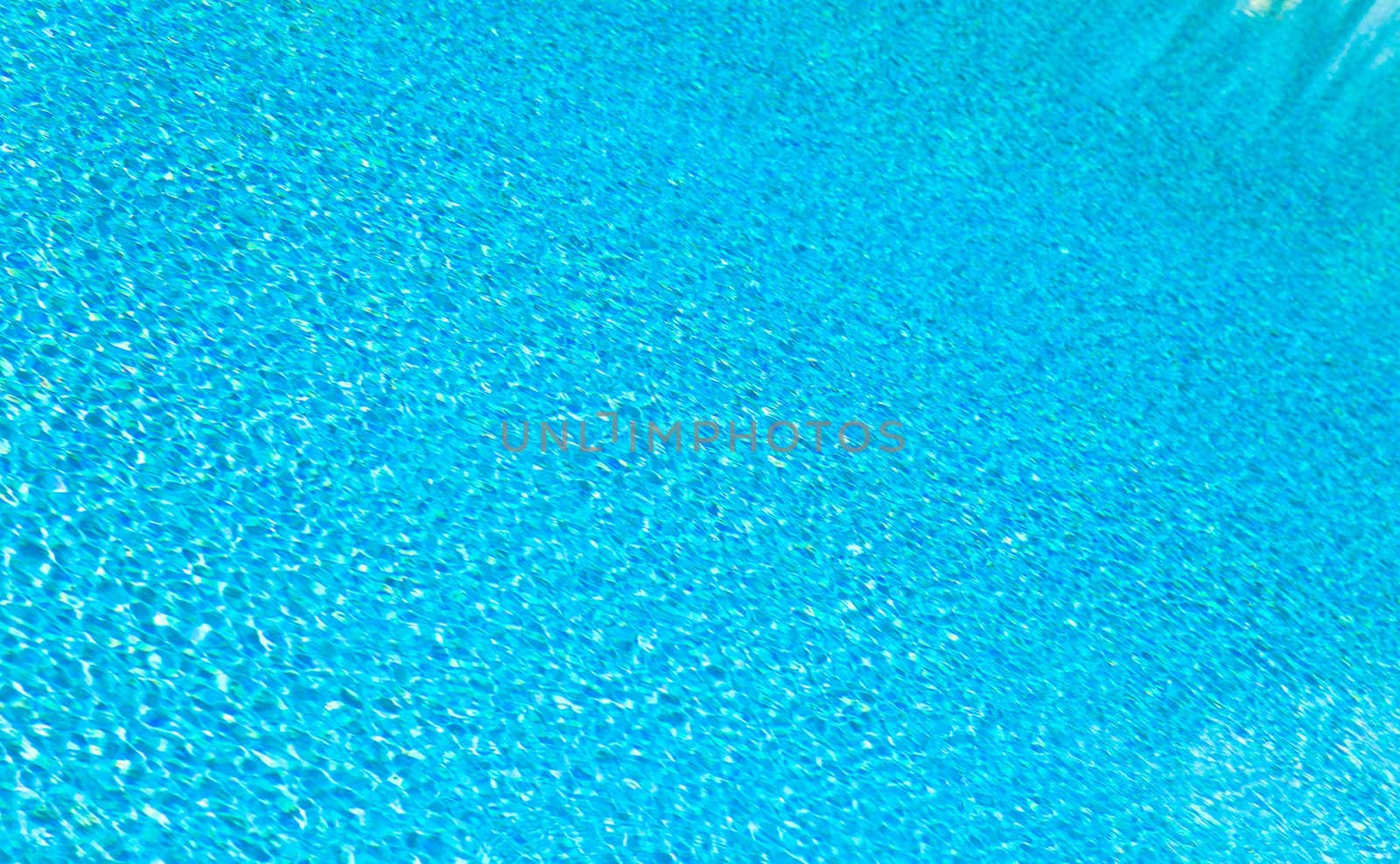 Abstract composition of the water of a swimming pool and its reflections