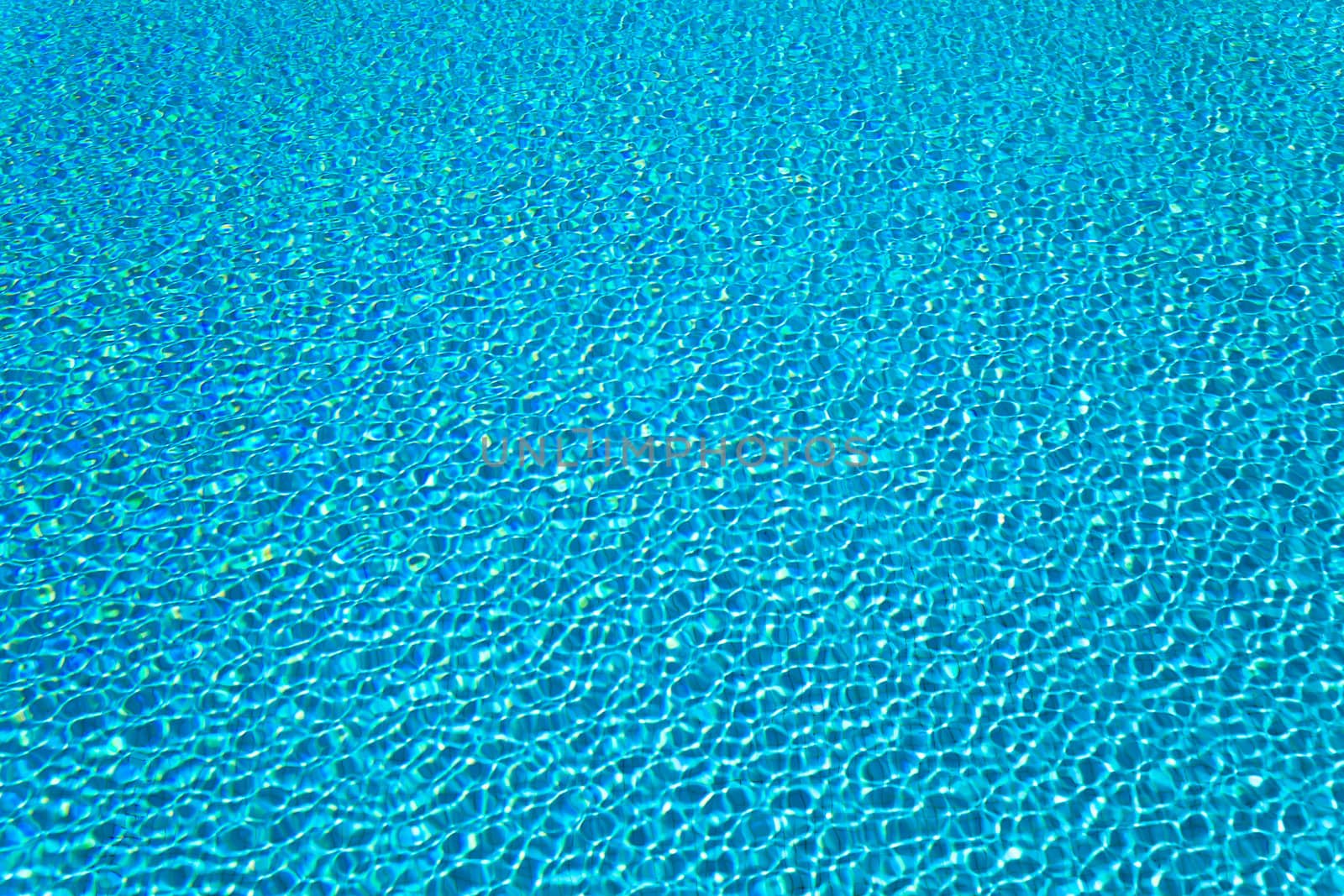 Abstract composition of the water of a swimming pool and its reflections