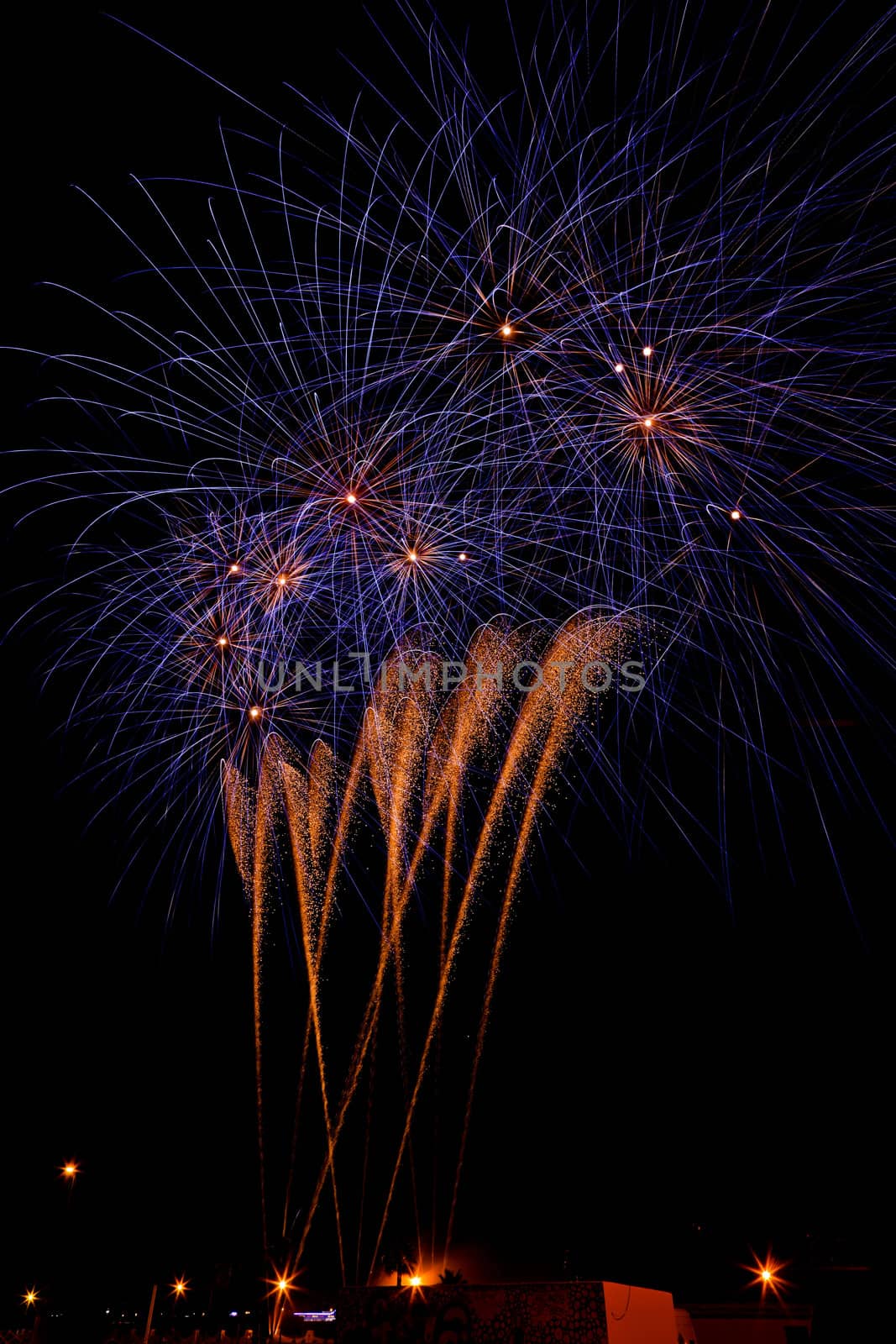 Firework streaks in the night sky