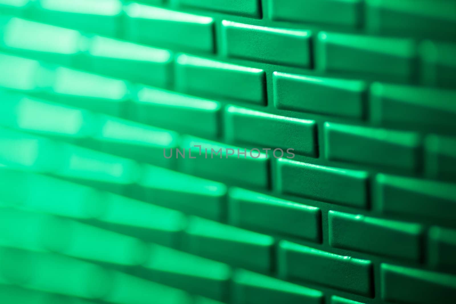 A wall formed by metal bricks