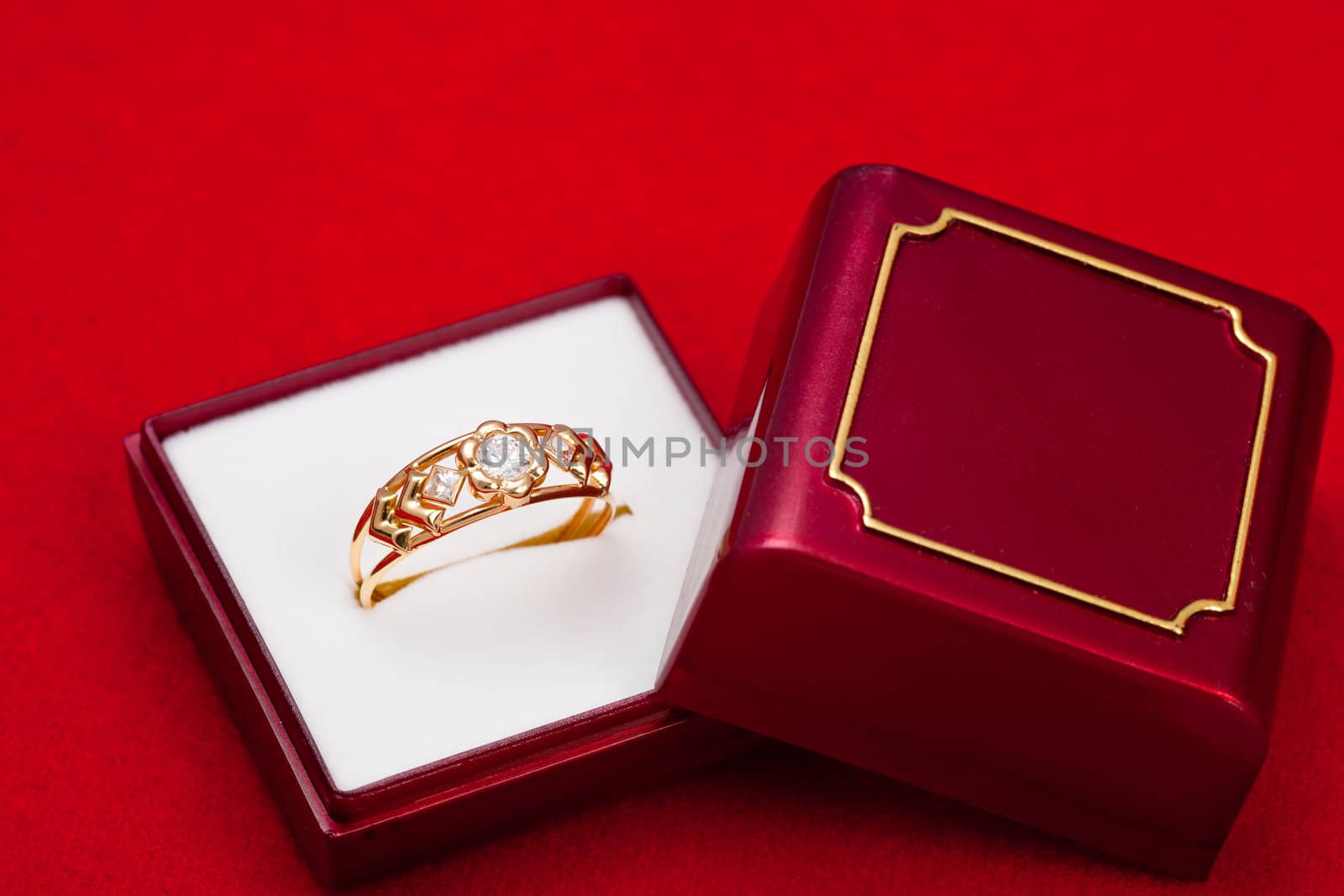 Fantastic gold ring adorned with several white zirconia