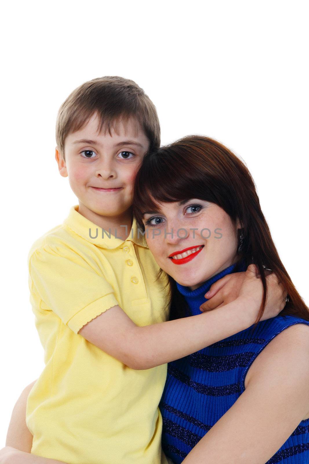 little boy hugs a young beautiful girl on the white background
