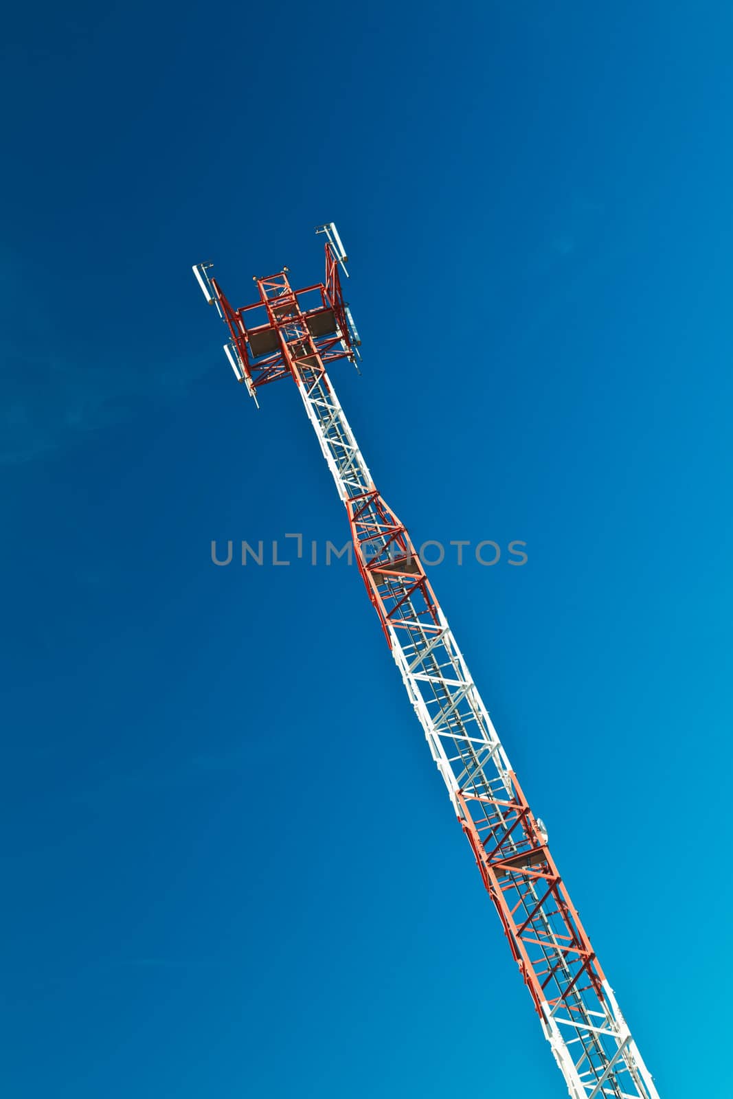 Communications tower with a beautiful blue sky