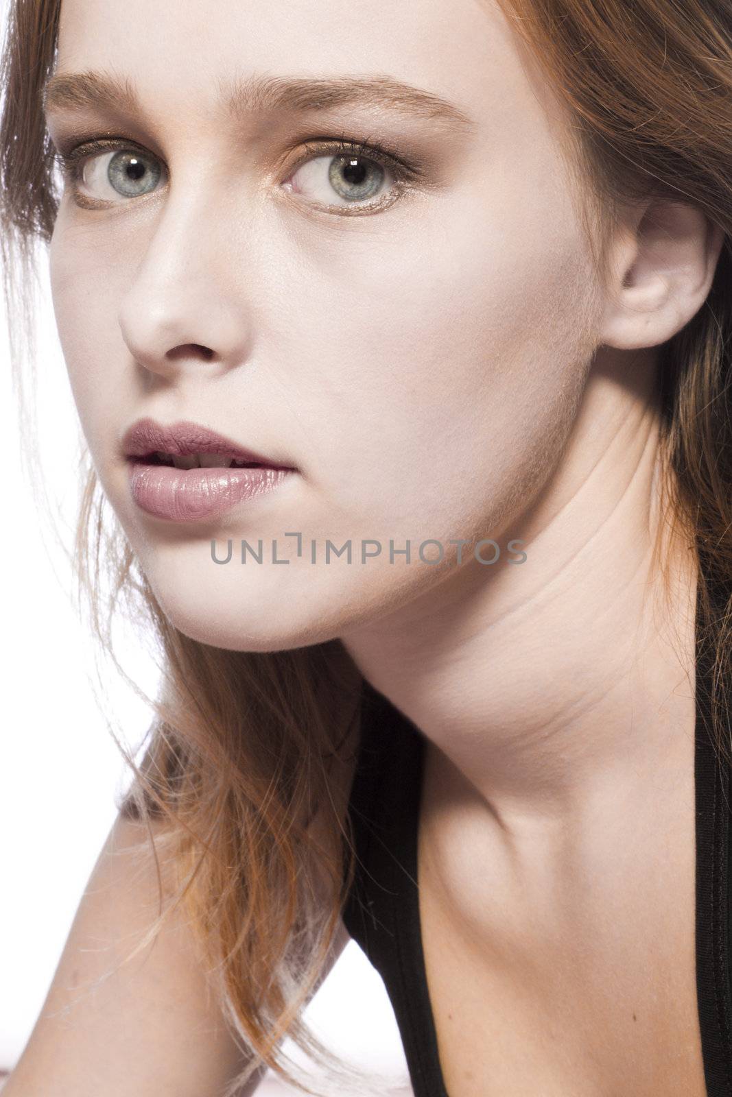 Studio portrait of a beautyful model looking surprised