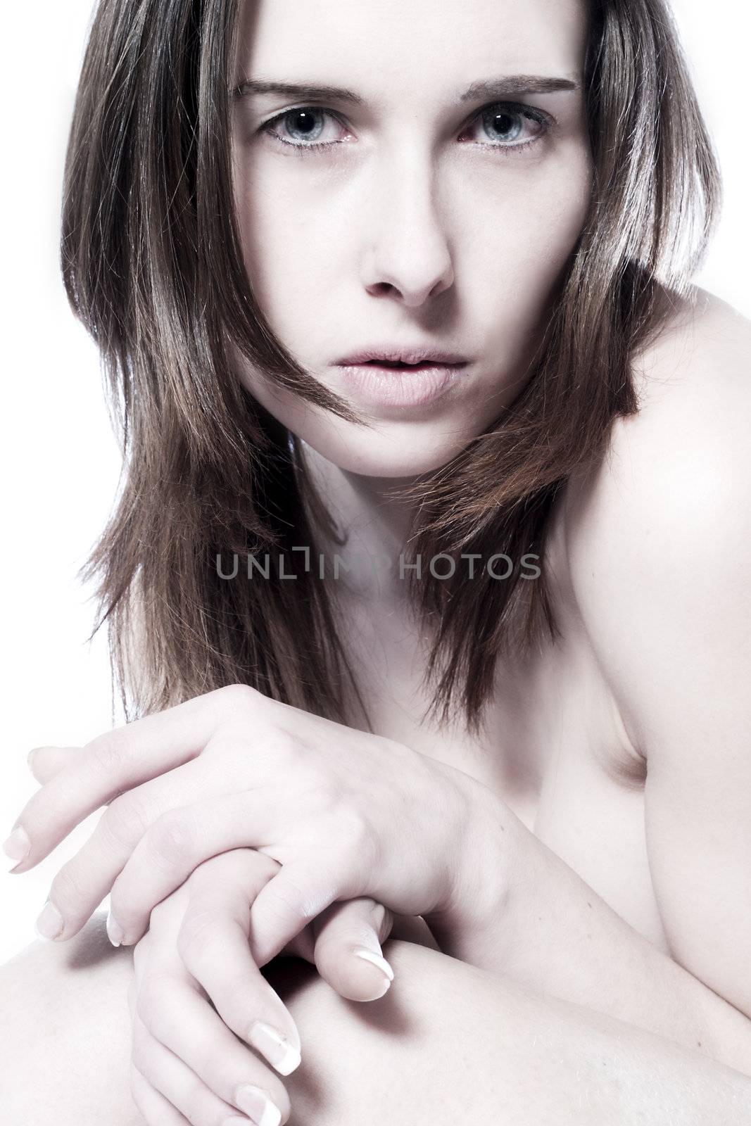 Studio portrait of a young woman making eye contact