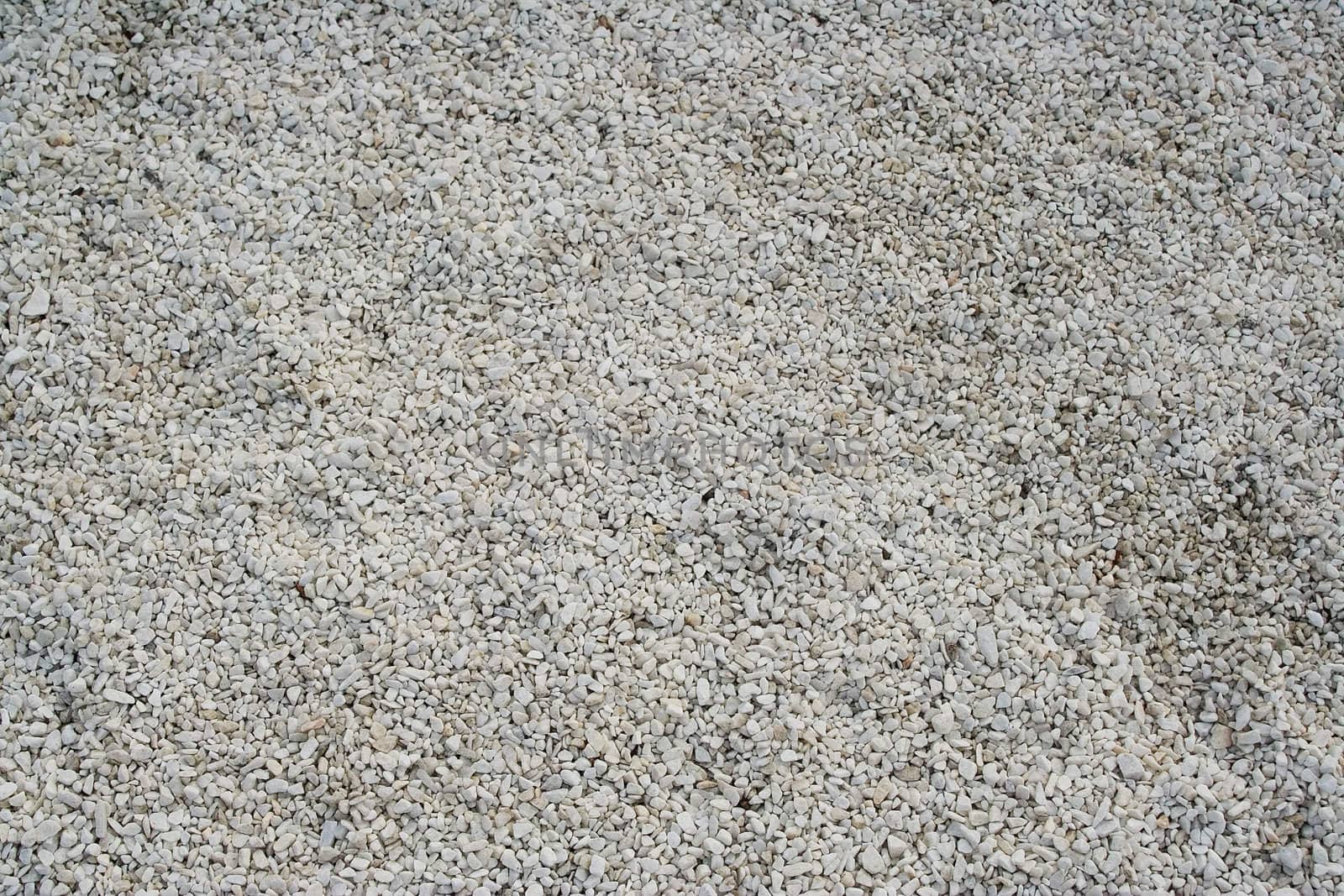 Lots of uneven white pebbles ideally suited for a background