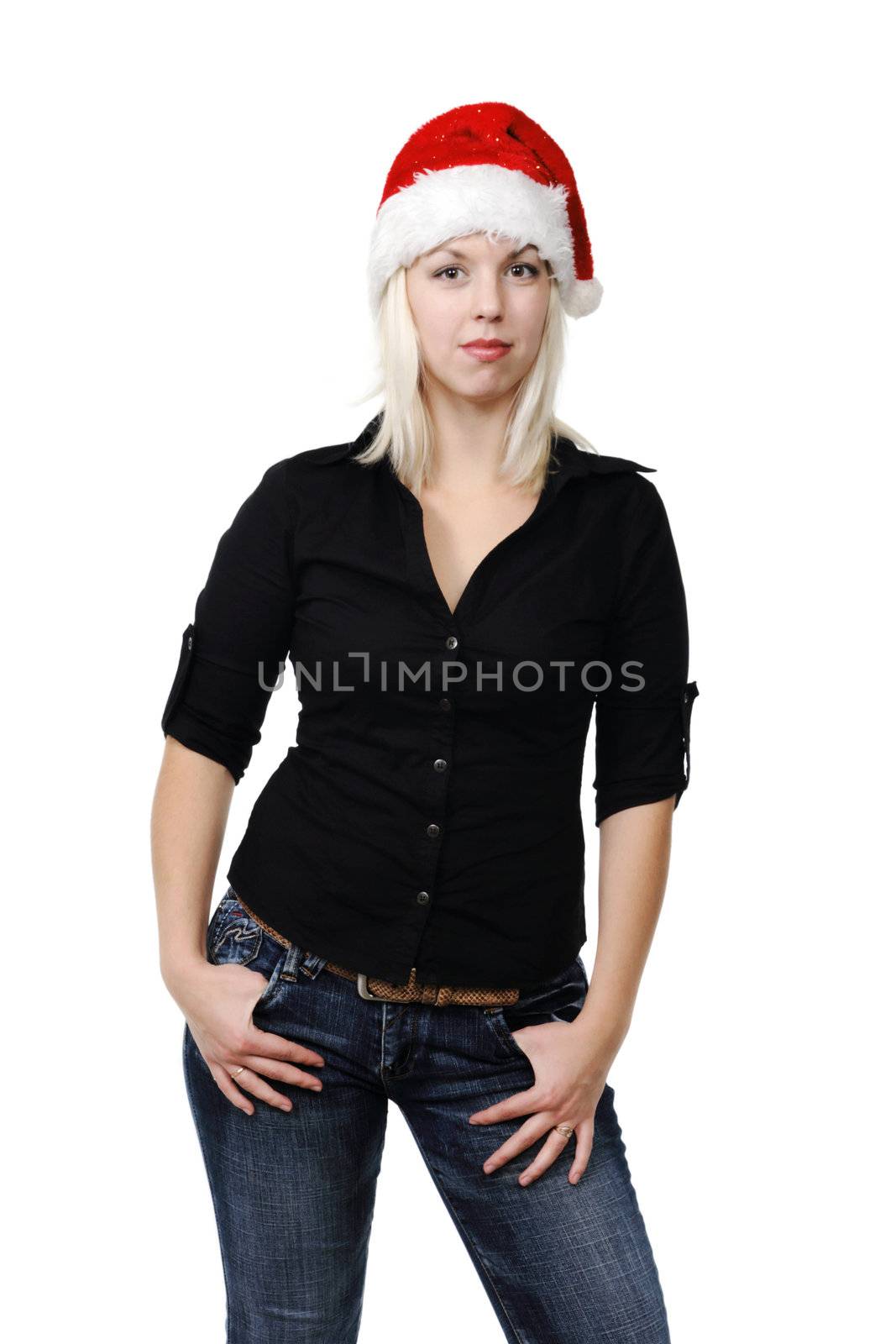 Young girl in a Santa Claus hat on the white background
