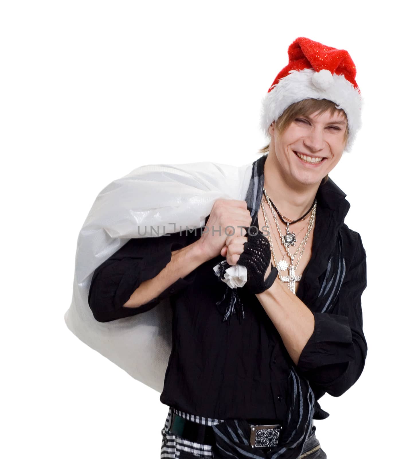 young man in a Santa Claus hat on white background
