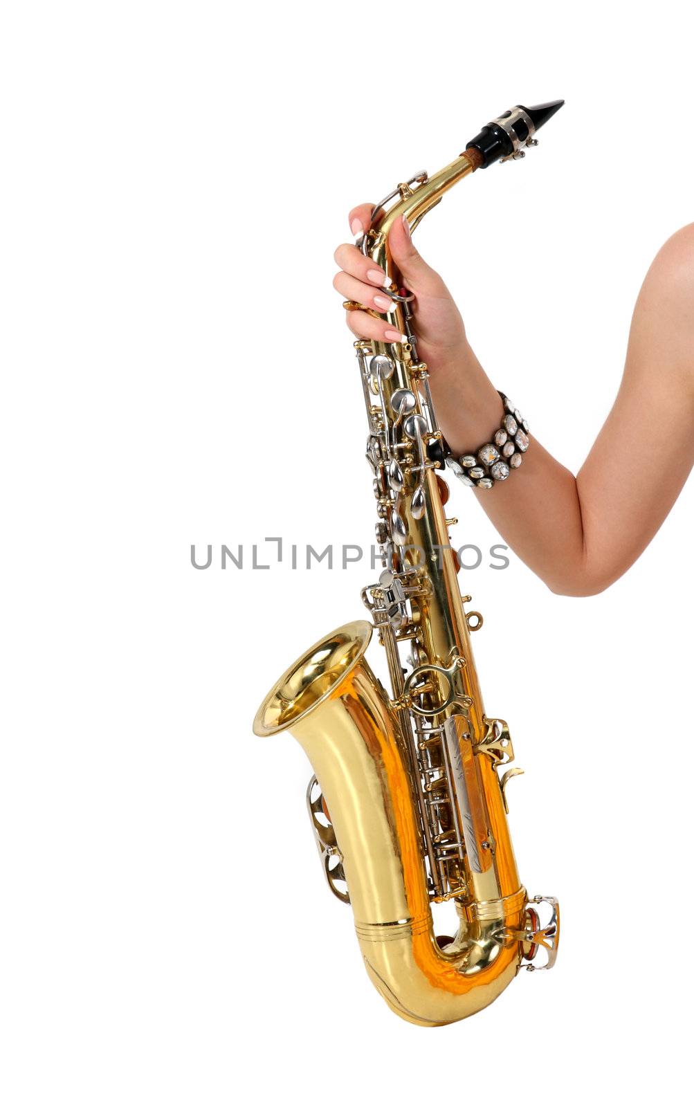 Saxophone in the women's hand on the white background
