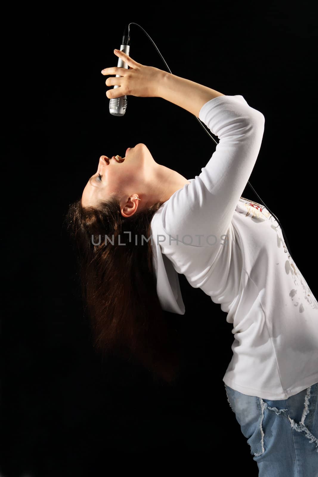 Soloist rock band on the black background
