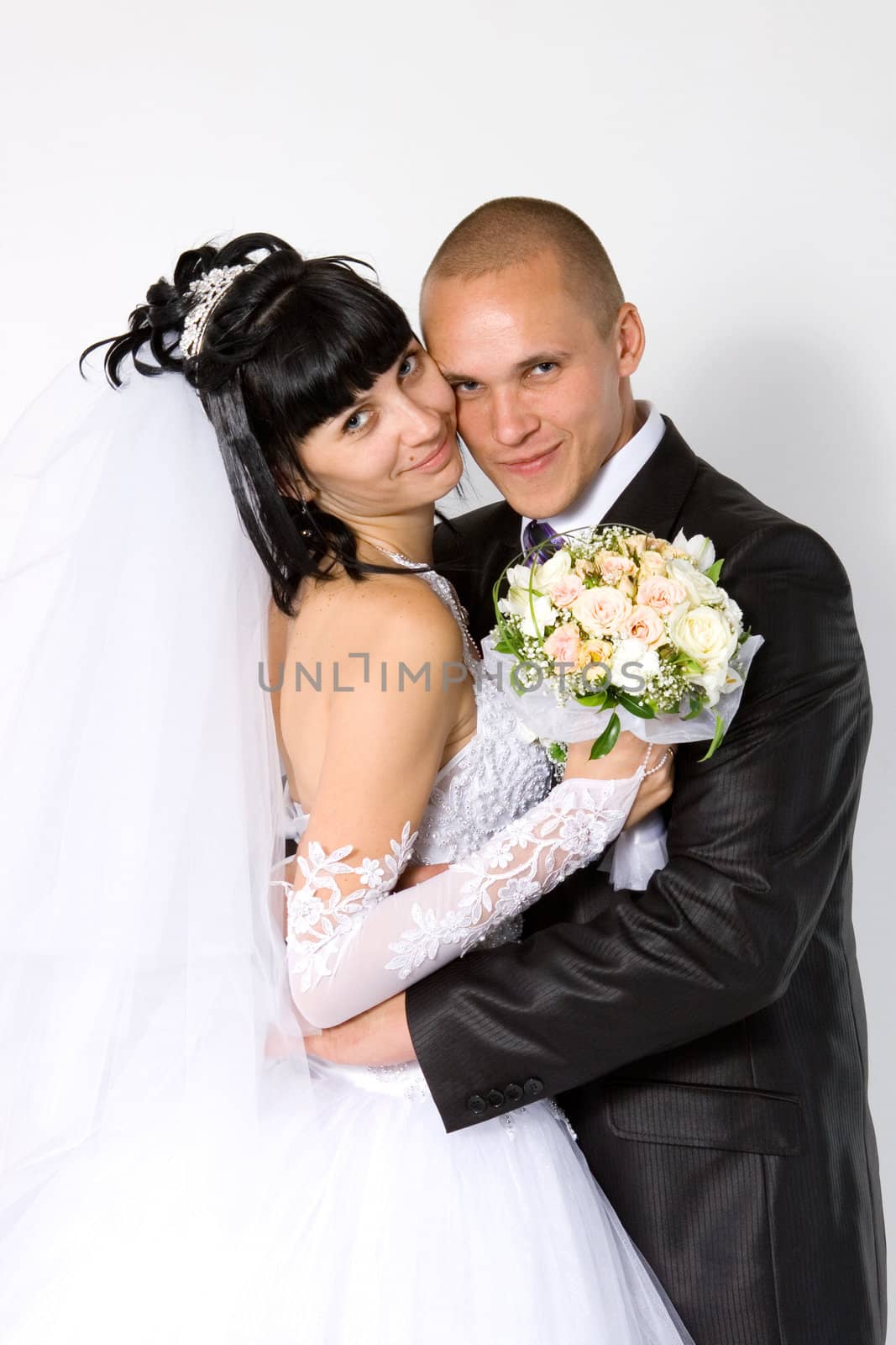 bride to the bridegroom on a white background
