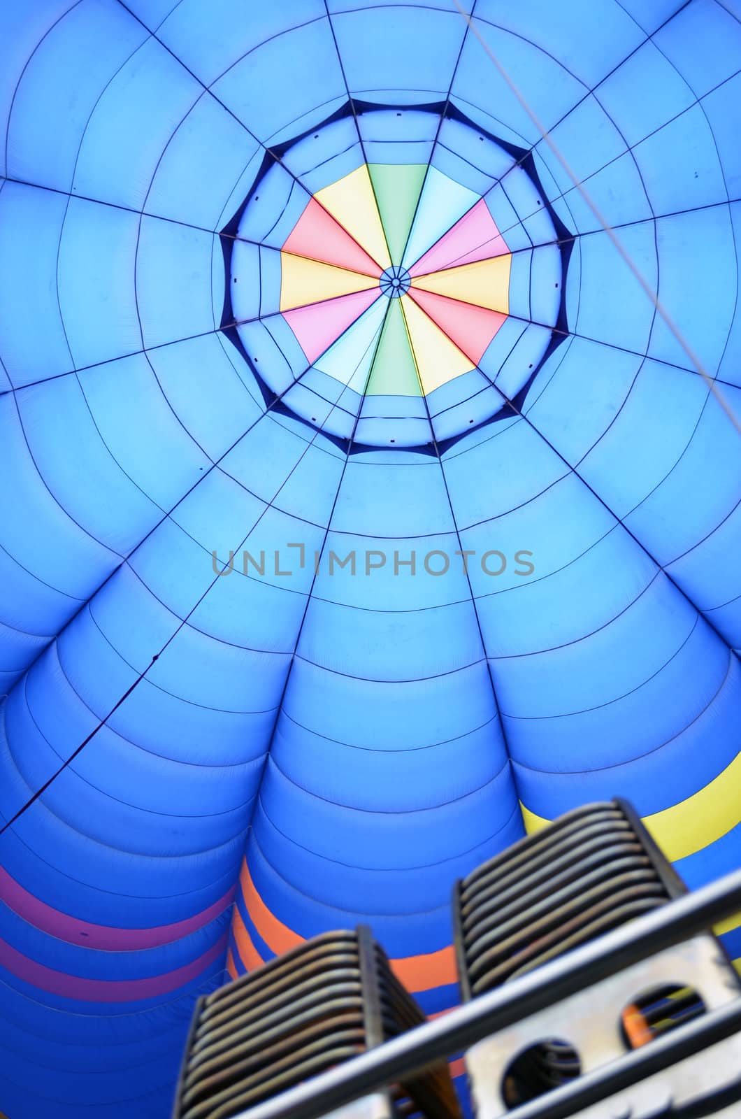 View of a hot air balloon from inside with burners