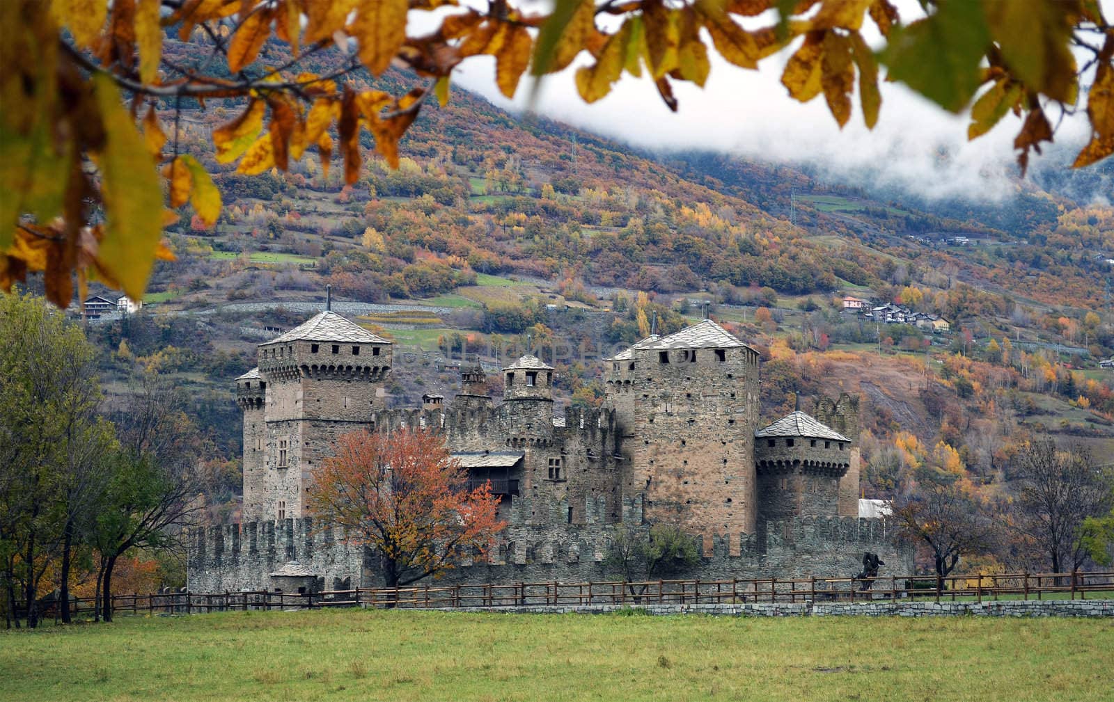 View of the Fenis castle in northern Italy in autumn