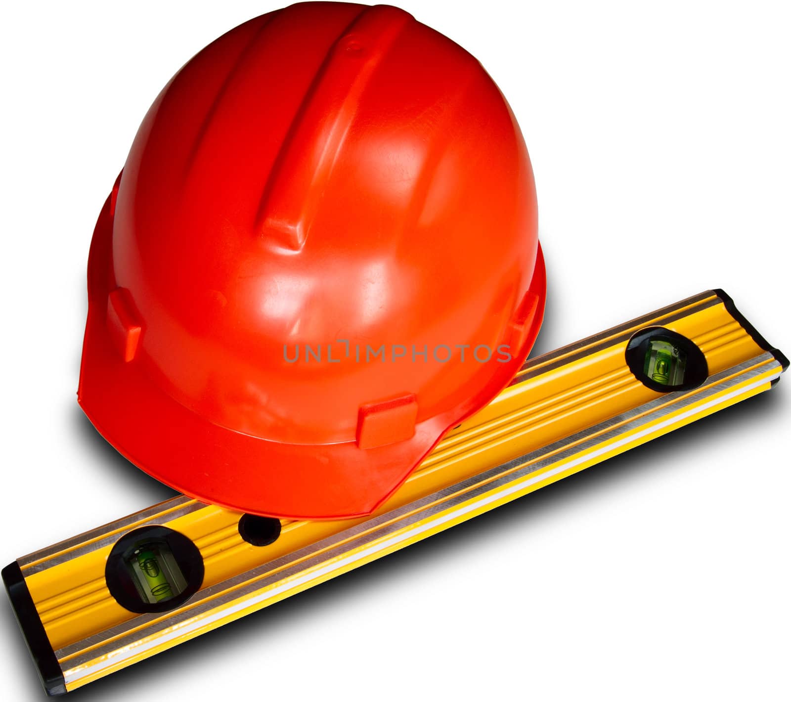 building red helmet and yellow level isolated on white