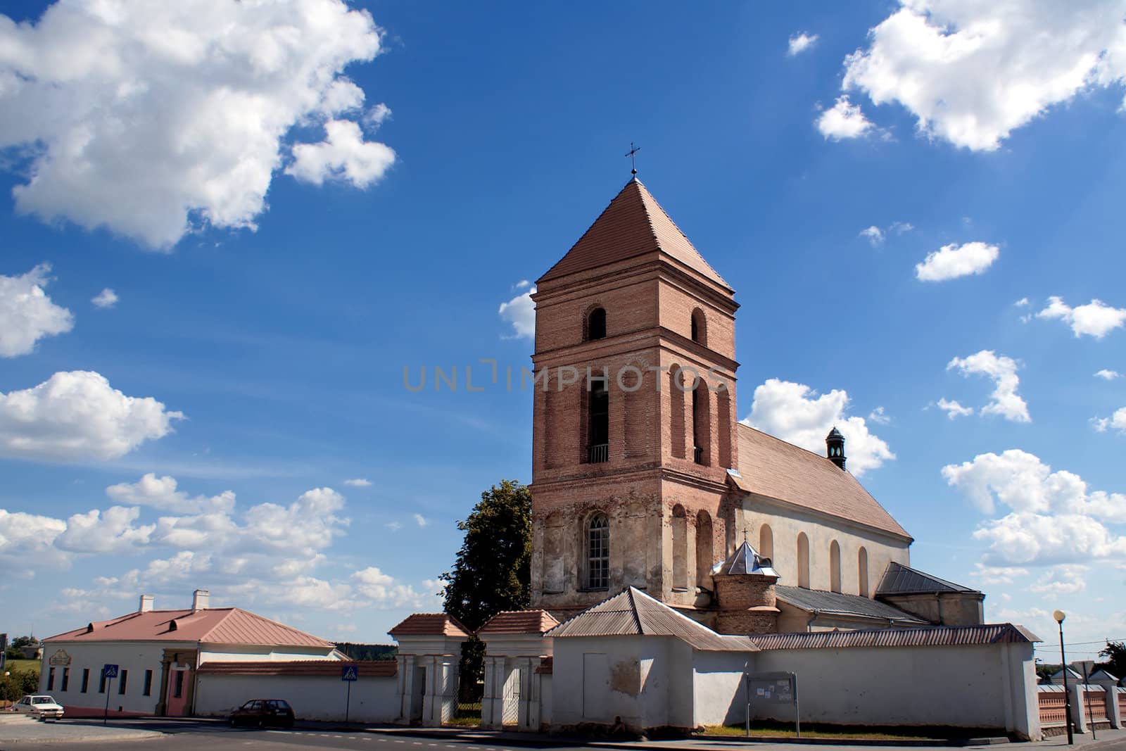 A red brick catholic village church in Belarus