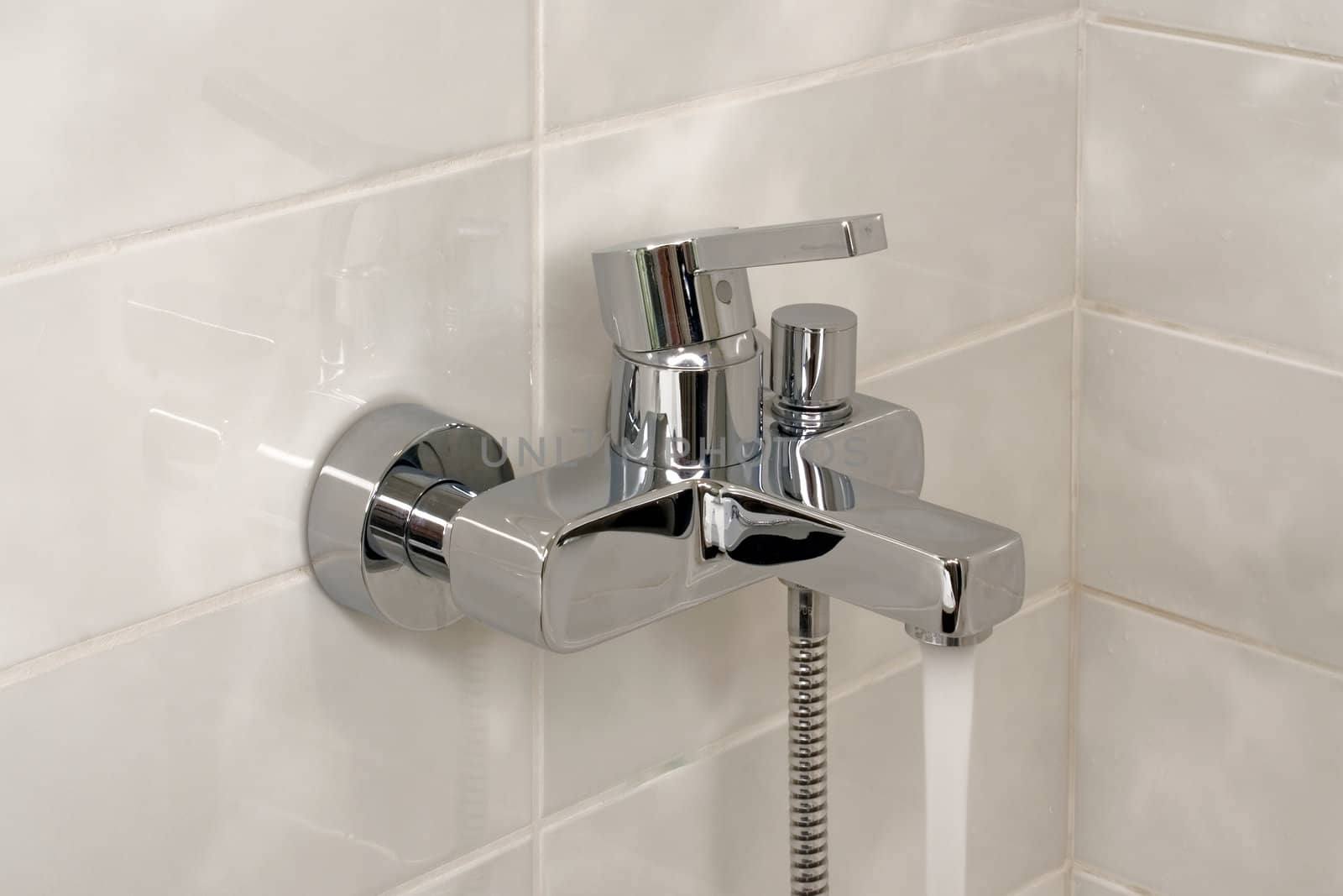 Water stream from modern faucet