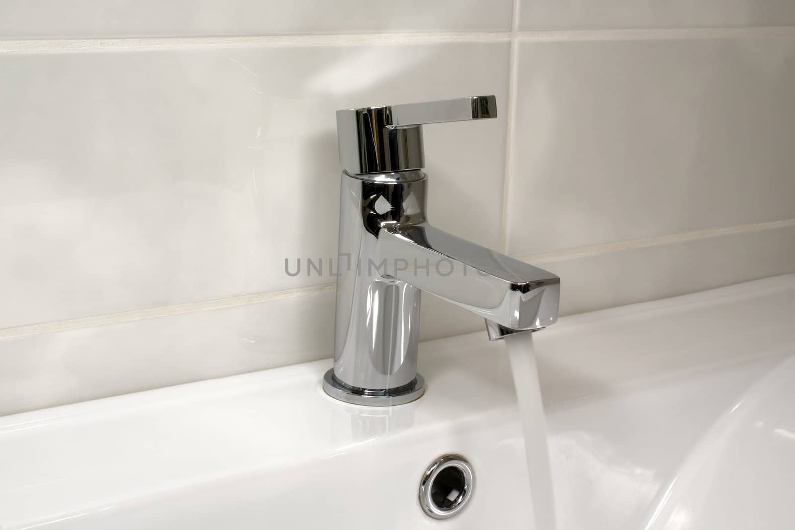 Water stream from clean modern tap