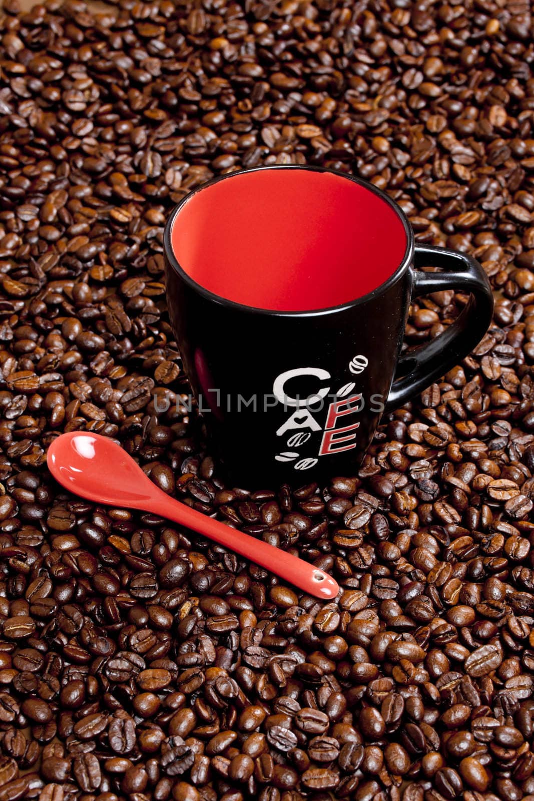 empty coffee cup with coffee beands