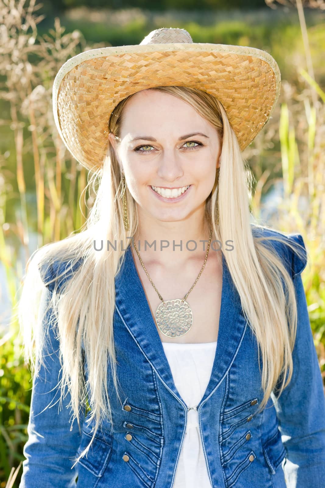 portrait of young woman wearing a hat by phbcz