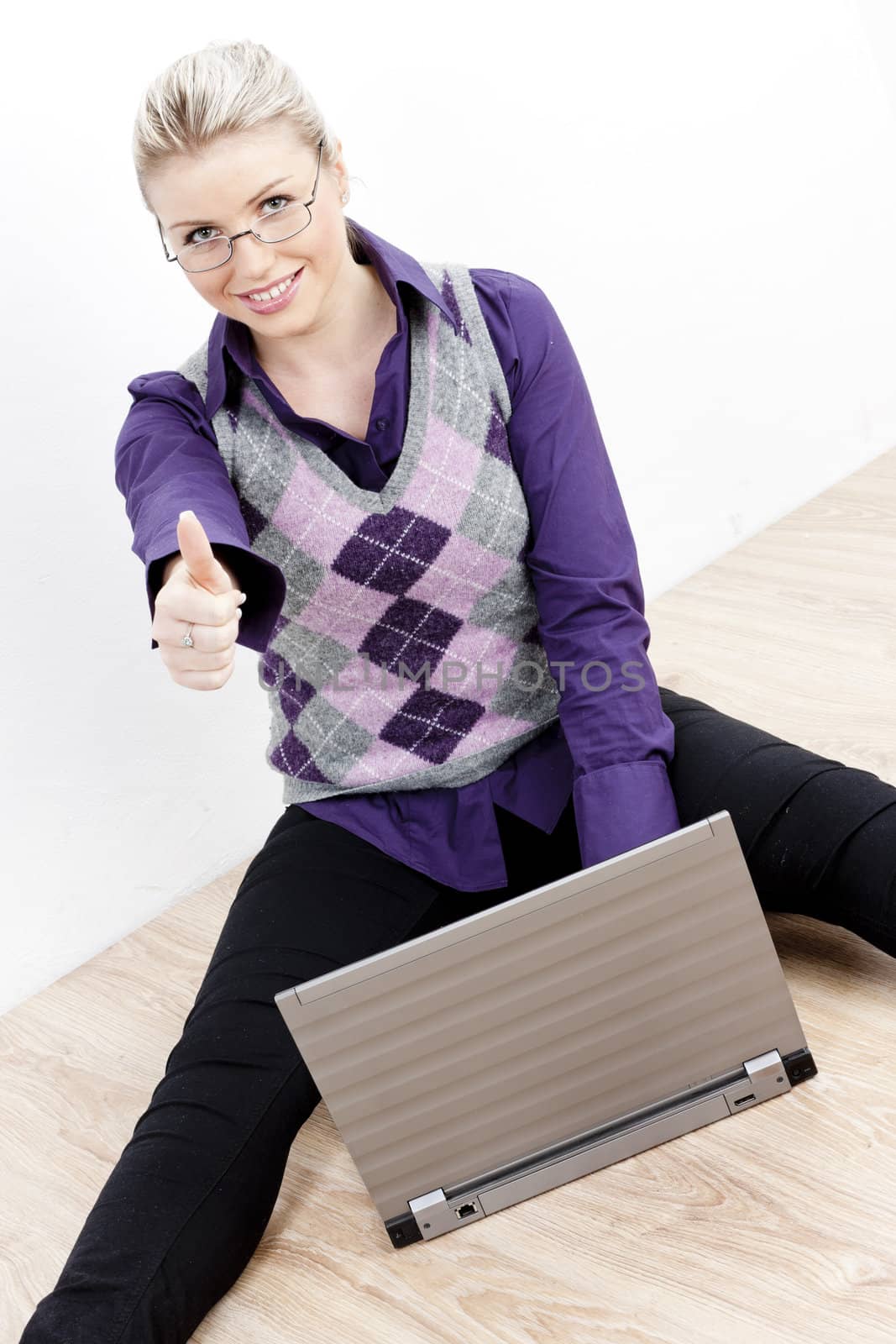 sitting young businesswoman with a notebook