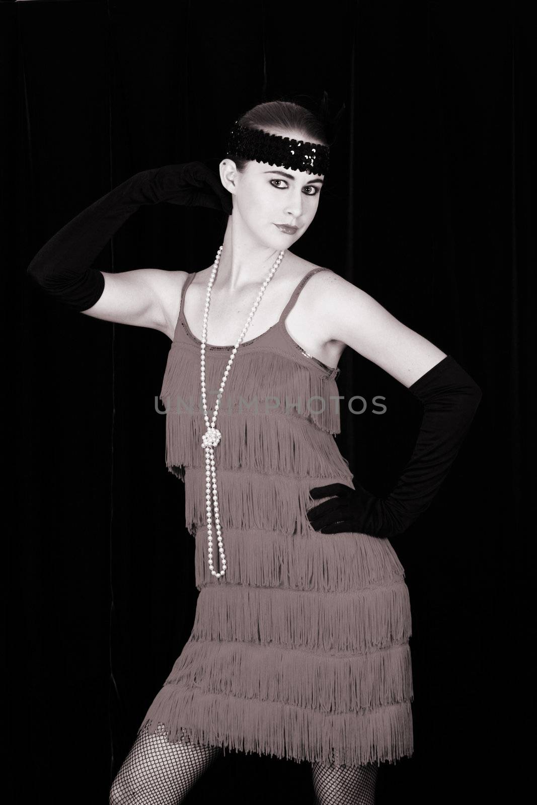 Beautiful young female in 1920 style attire