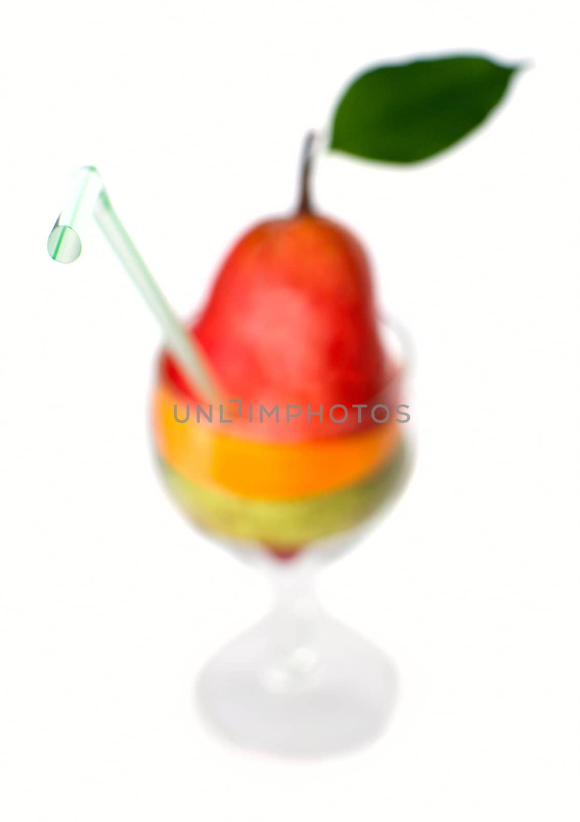 Fruit cocktail with tube, focus on the end of the tube