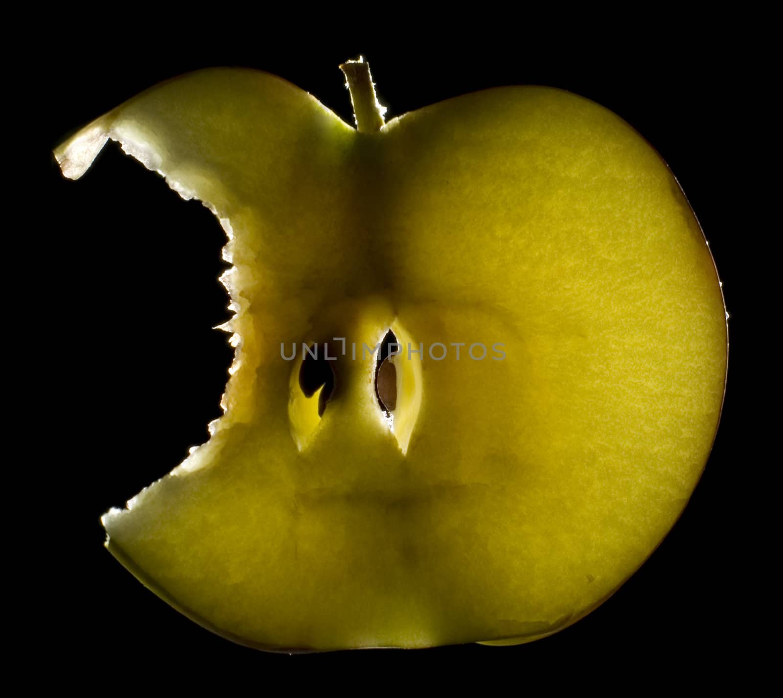 bite off piece of luminous apple